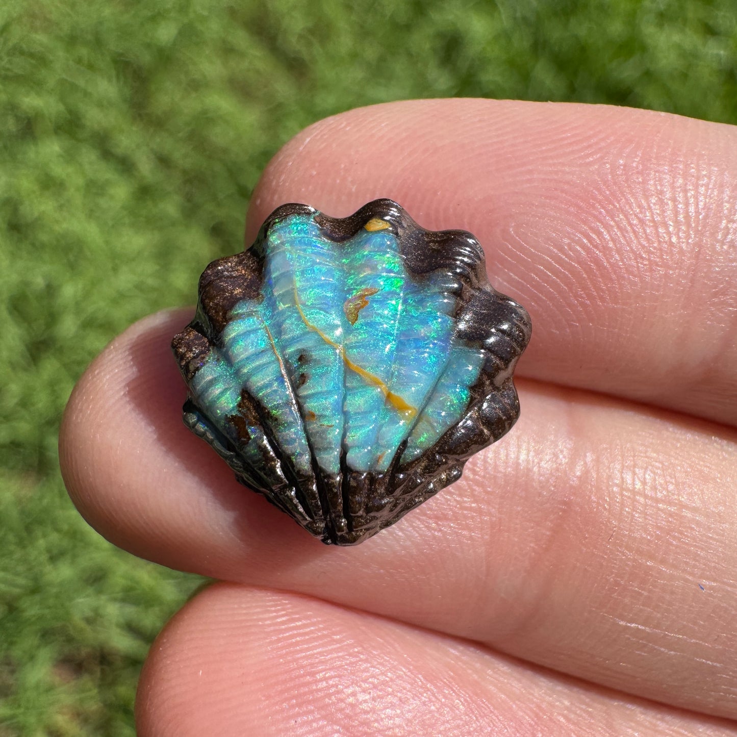7.09 Ct fan shell boulder opal carving