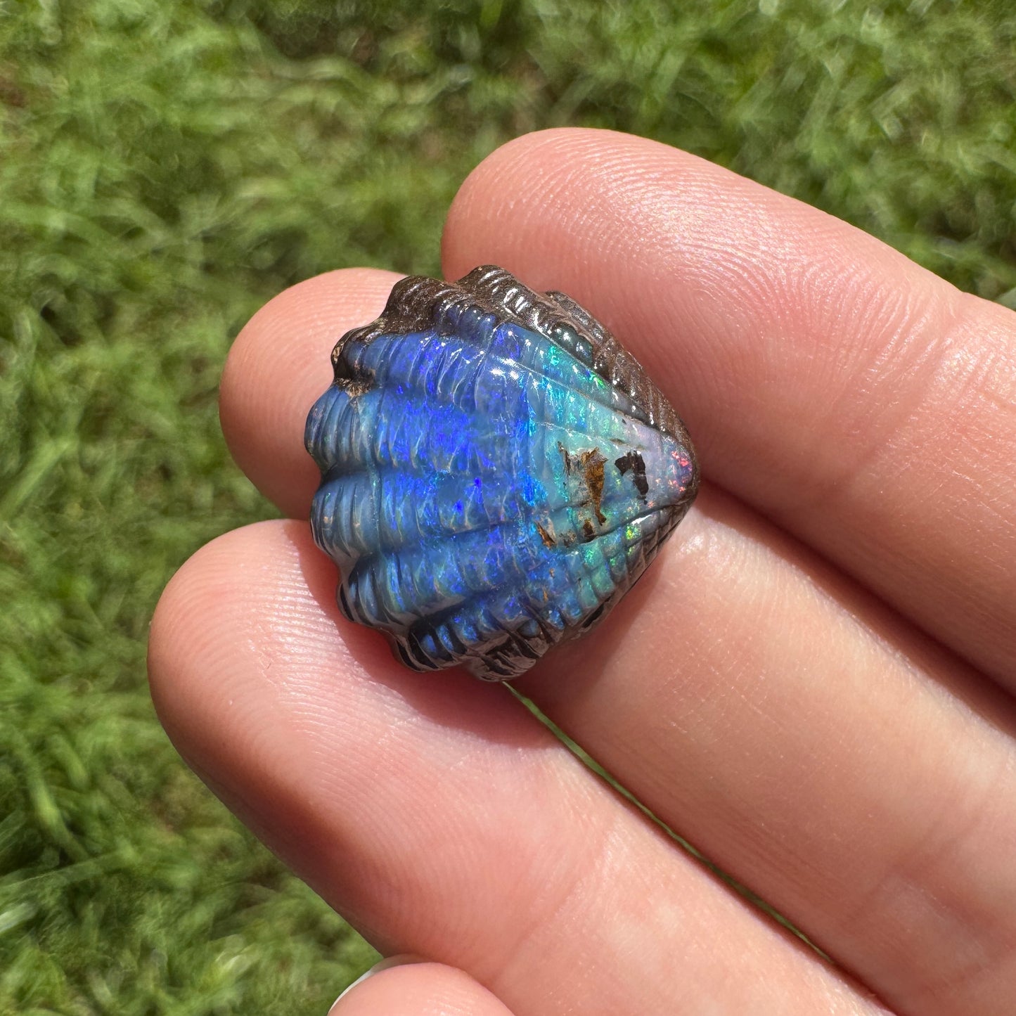 15.65 Ct fan shell boulder opal carving