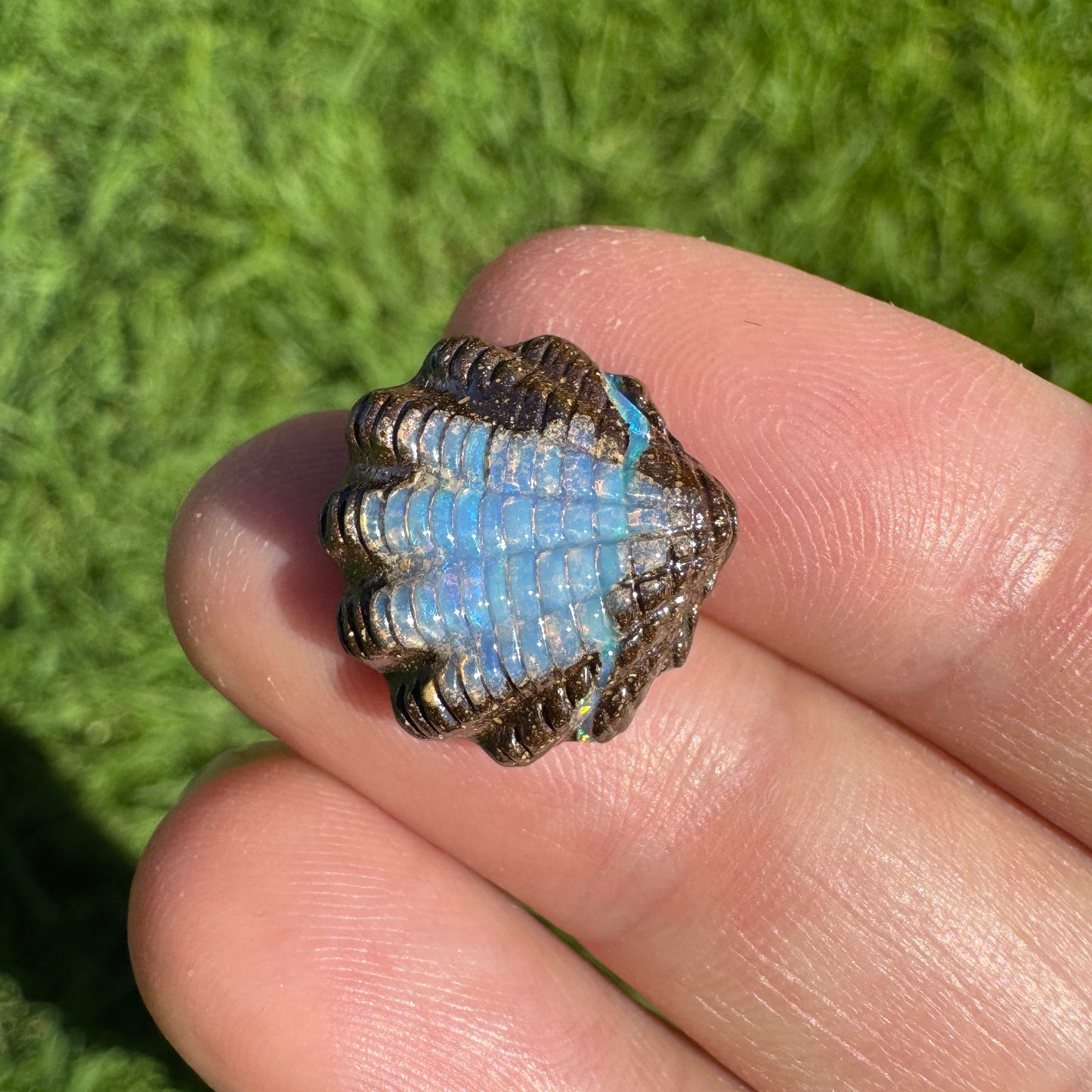 8.90 Ct fan shell boulder opal carving