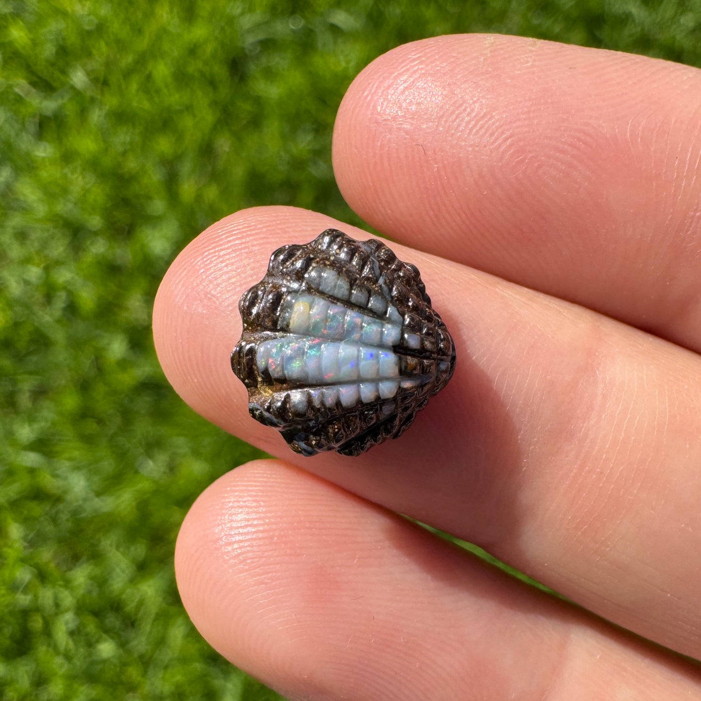 4.21 fan shell boulder opal carving