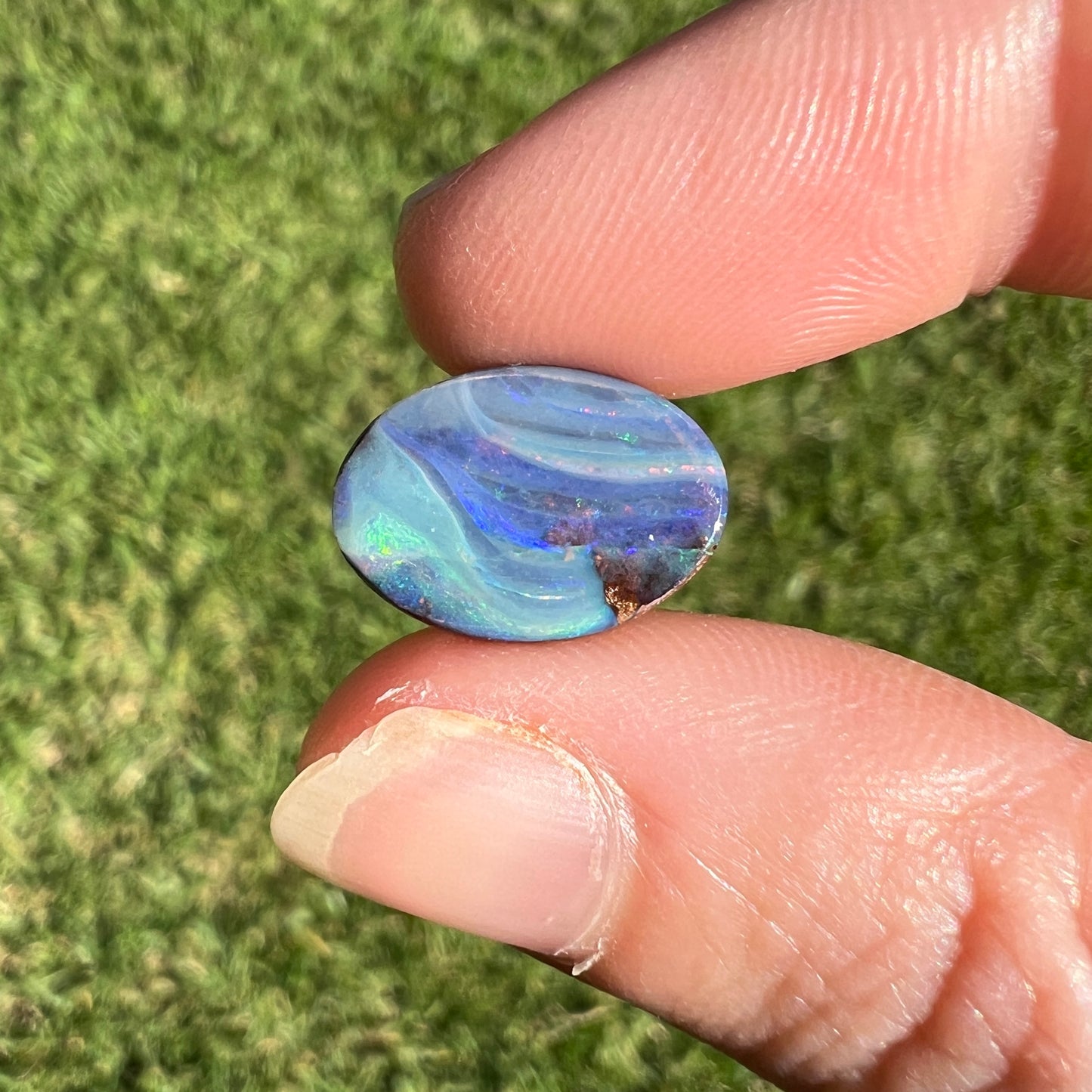 4.75 Ct stripy oval boulder opal