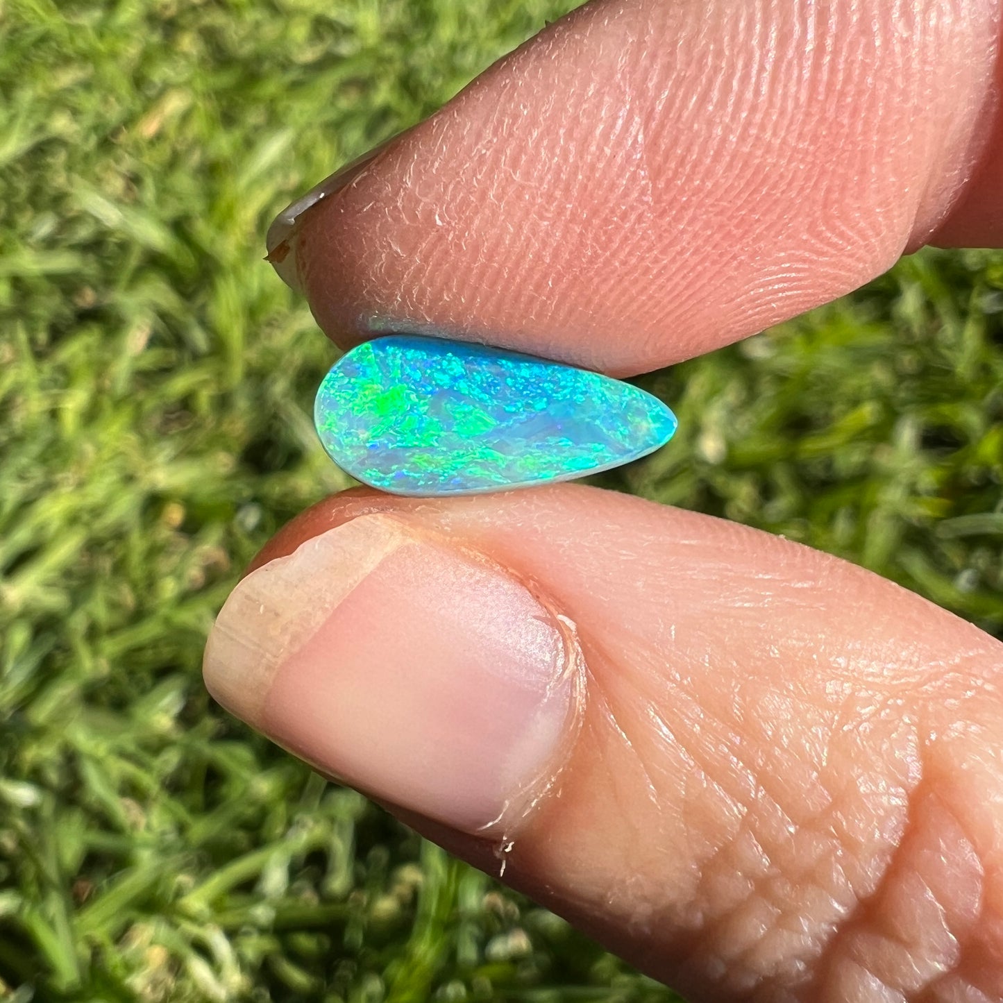 1.89 Ct bright green-blue boulder opal