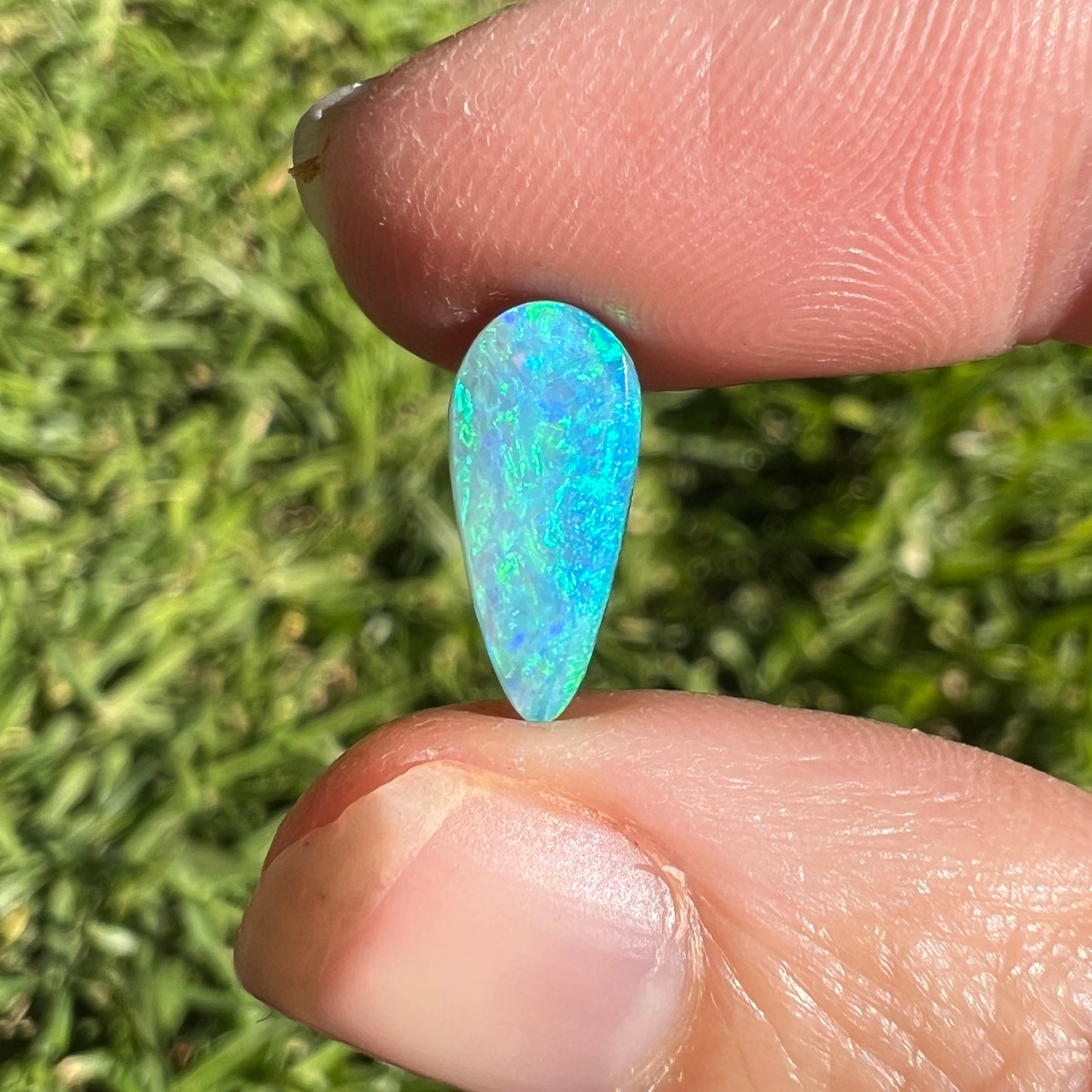 1.89 Ct bright green-blue boulder opal