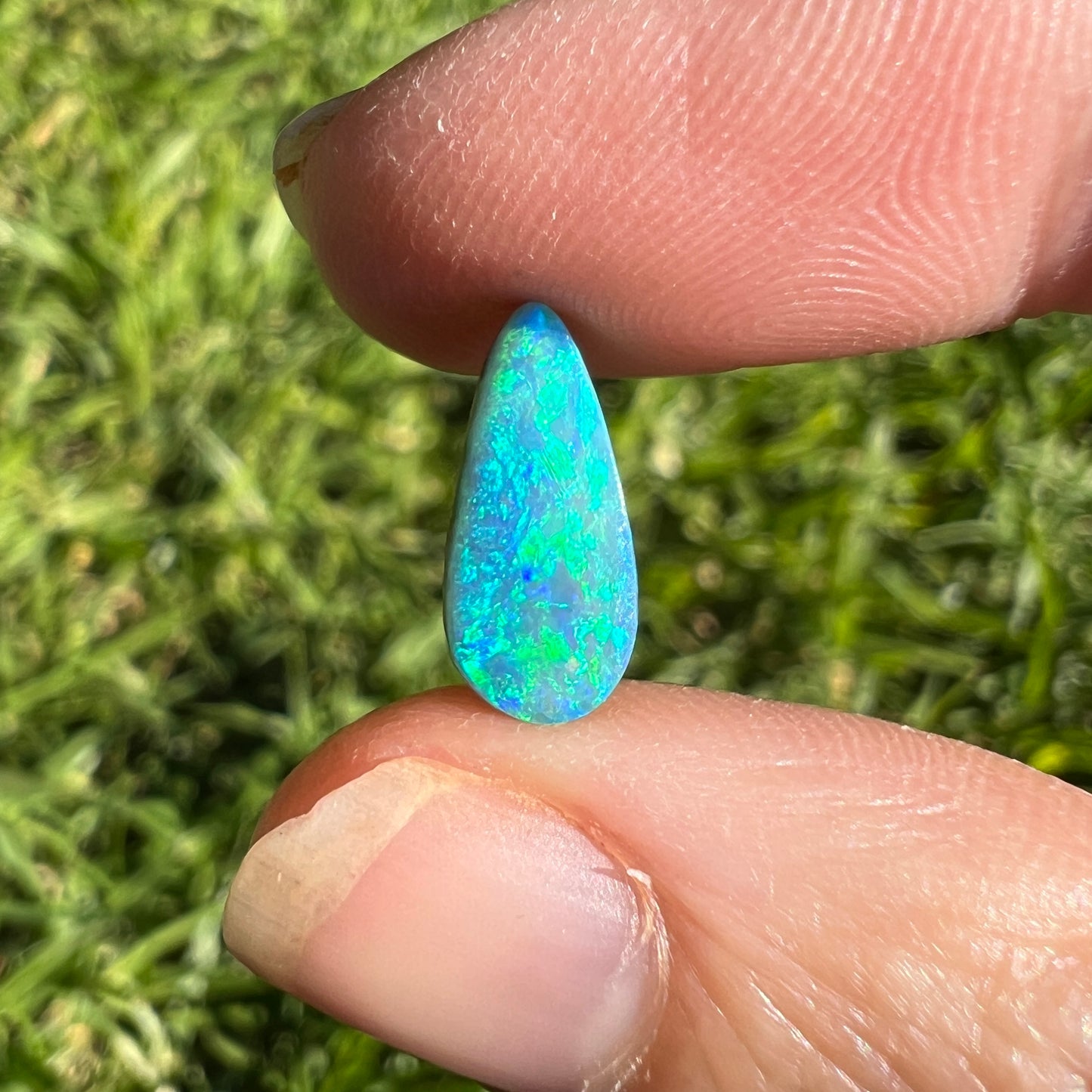 1.89 Ct bright green-blue boulder opal
