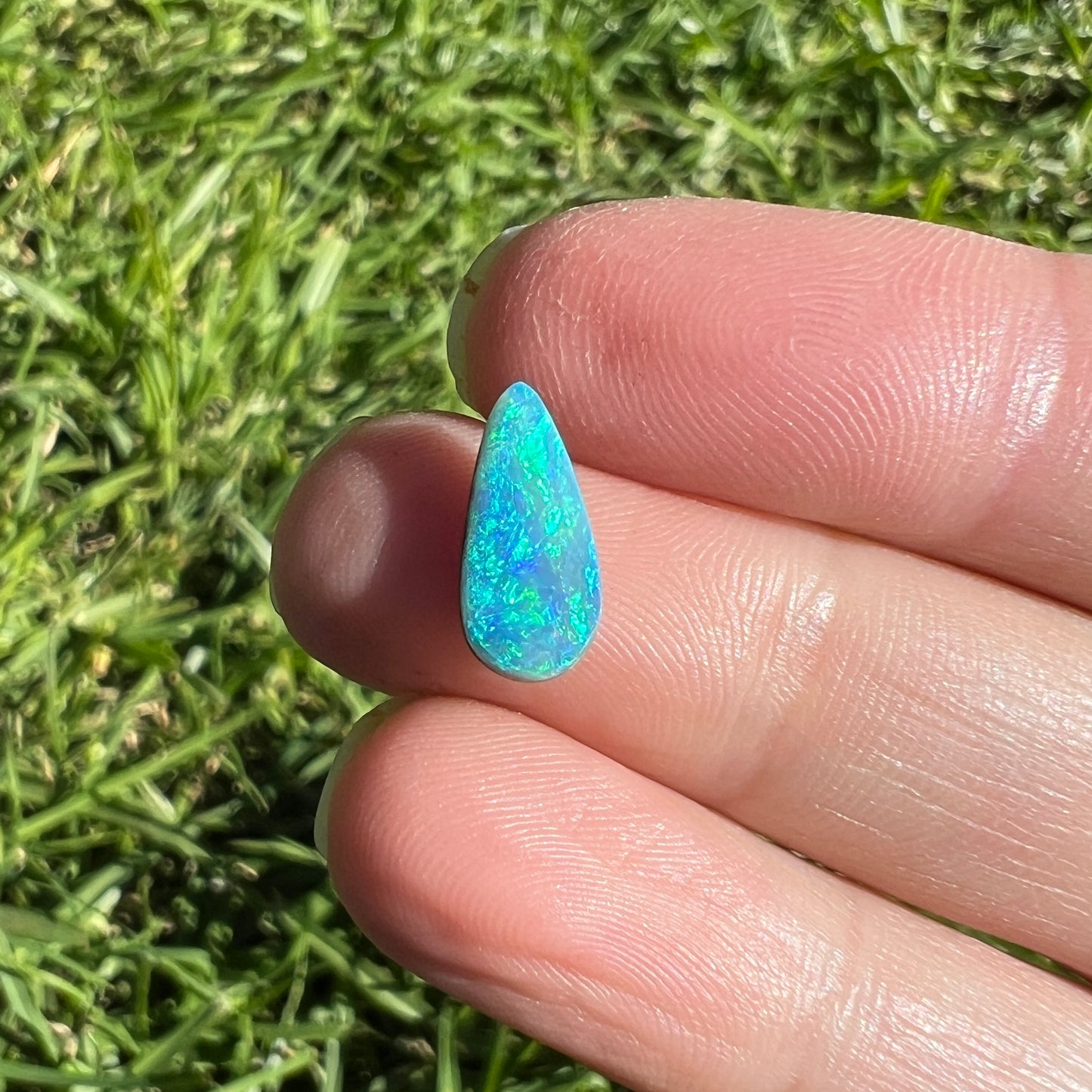 1.89 Ct bright green-blue boulder opal