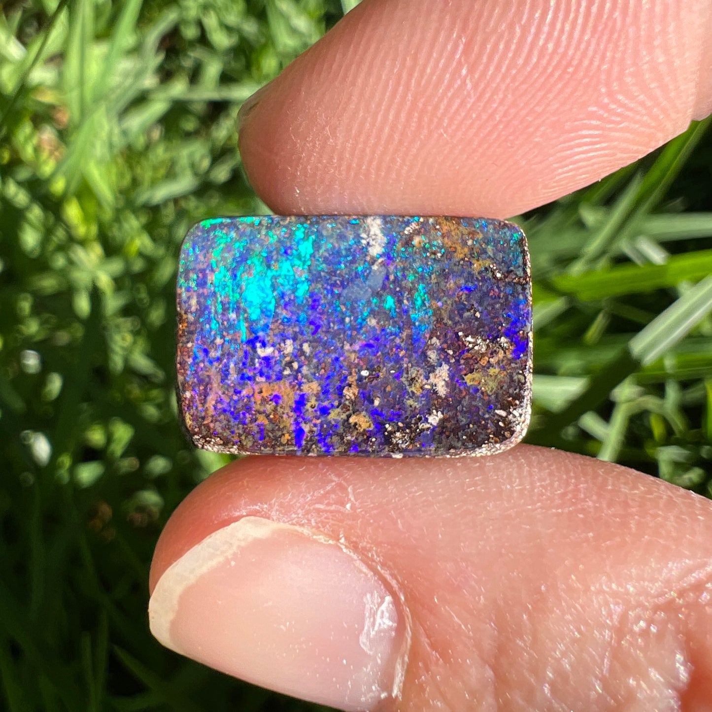 7.54 Ct purple and green boulder opal