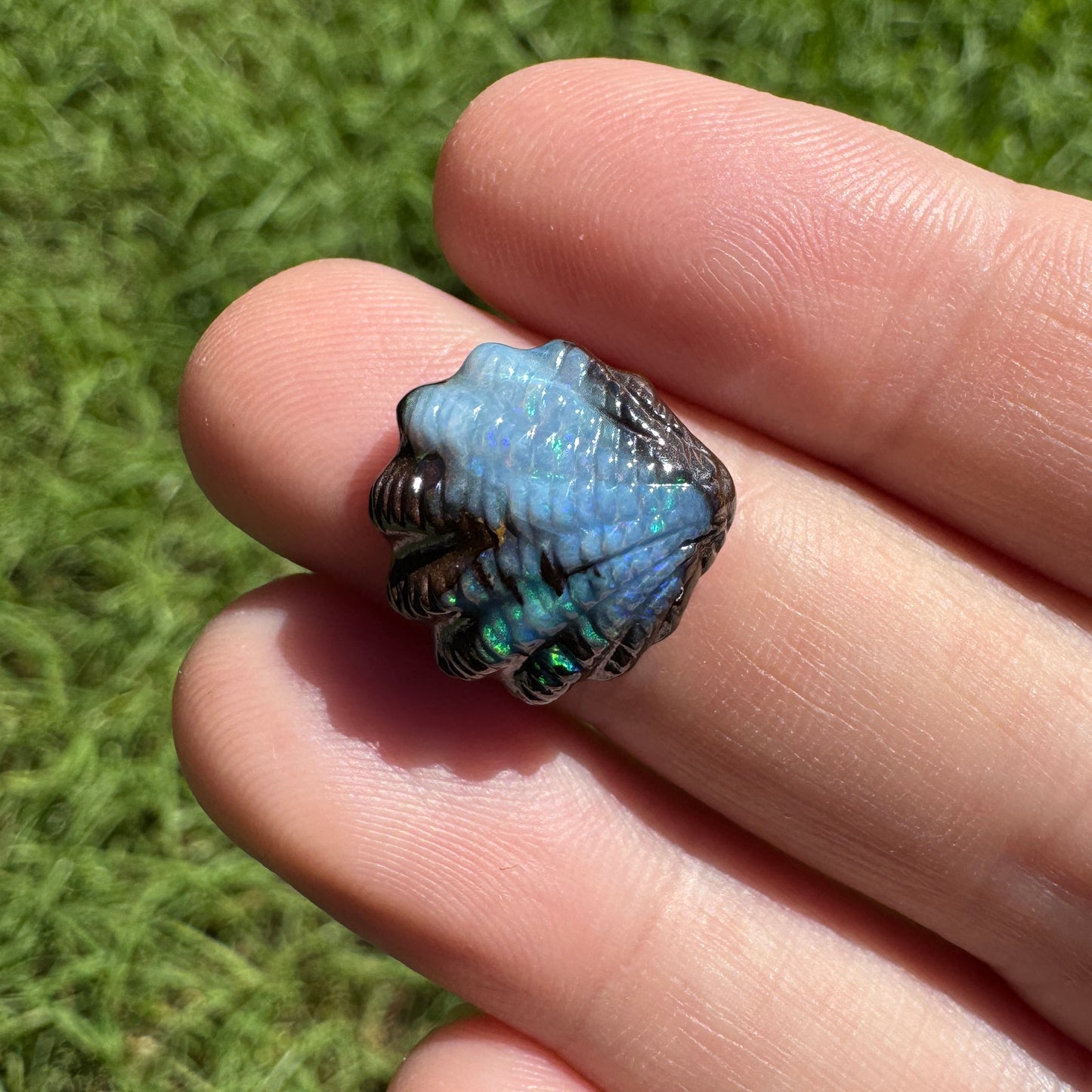 8.24 Ct fan shell boulder opal carving
