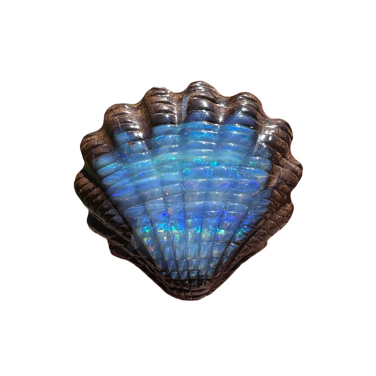 23.75 Ct fan shell boulder opal carving