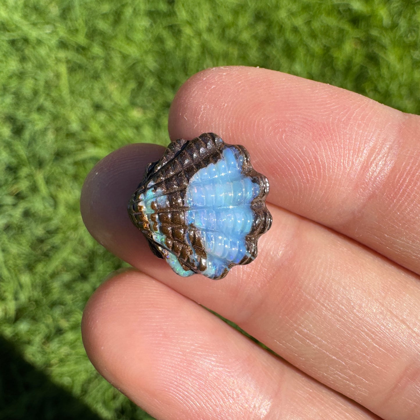 8.42 Ct fan shell boulder opal carving