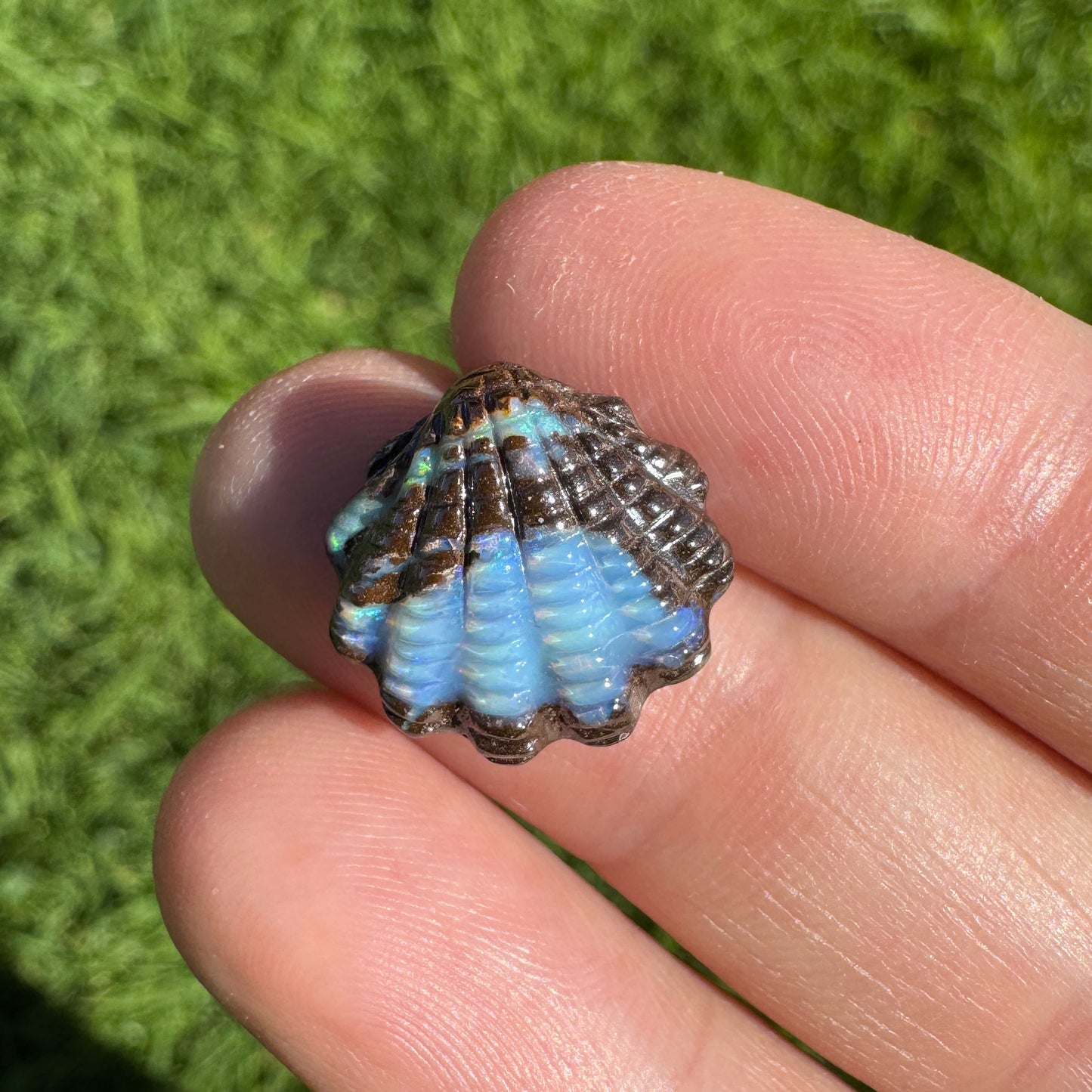 8.42 Ct fan shell boulder opal carving