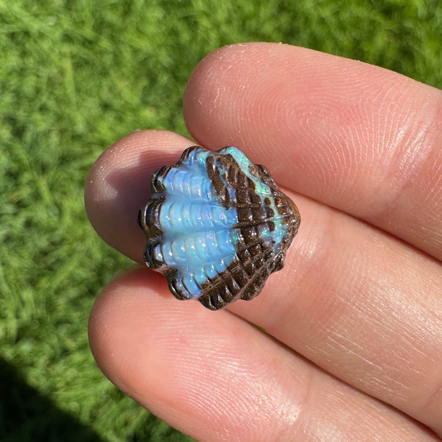 8.42 Ct fan shell boulder opal carving