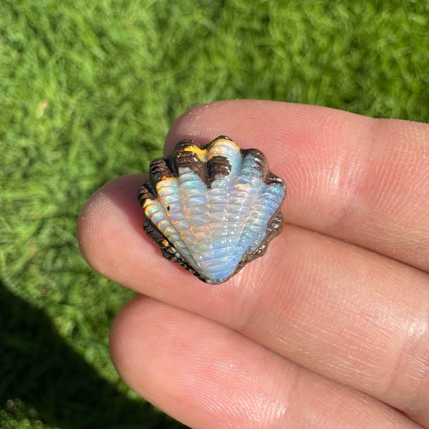 10.37 Ct fan shell boulder opal carving