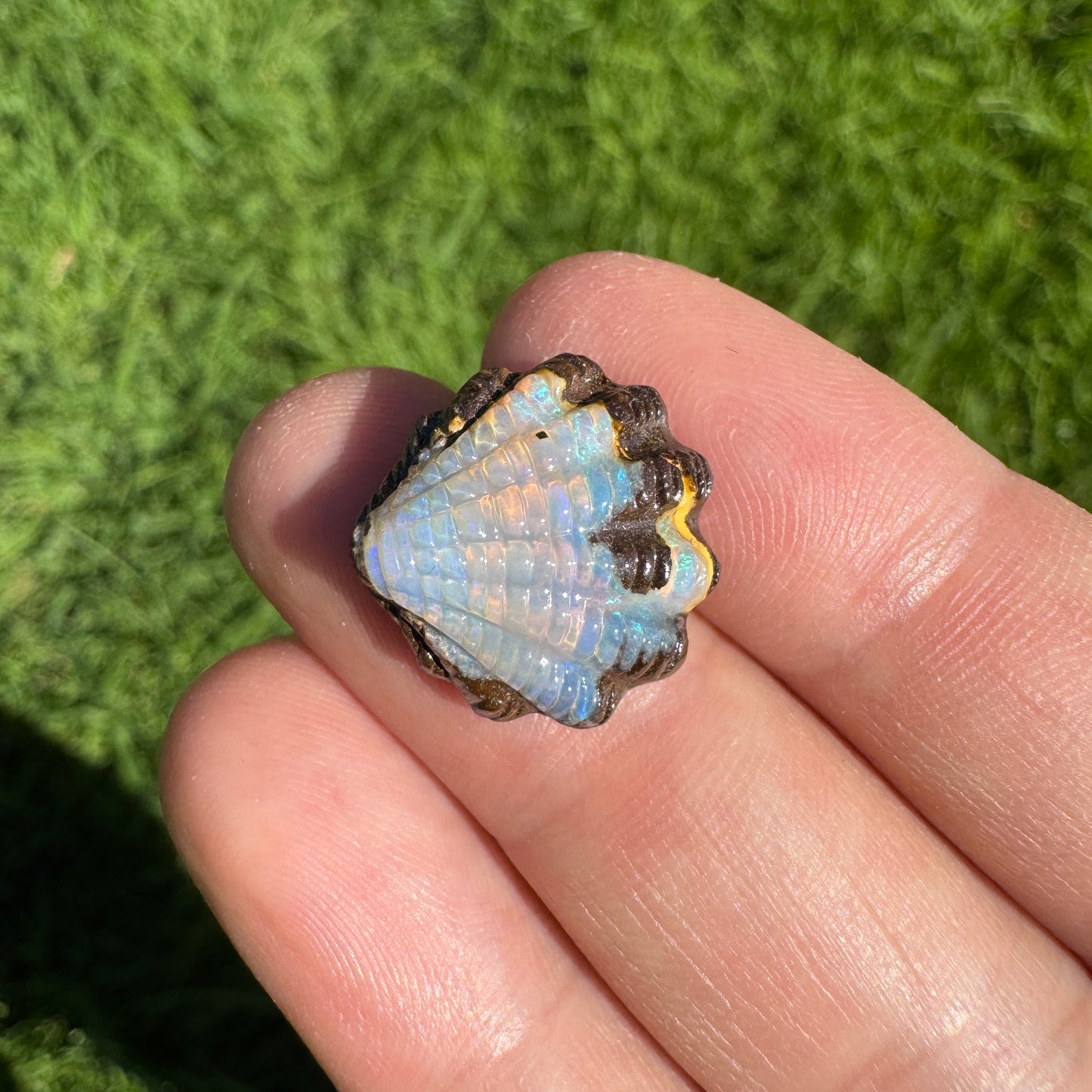 10.37 Ct fan shell boulder opal carving