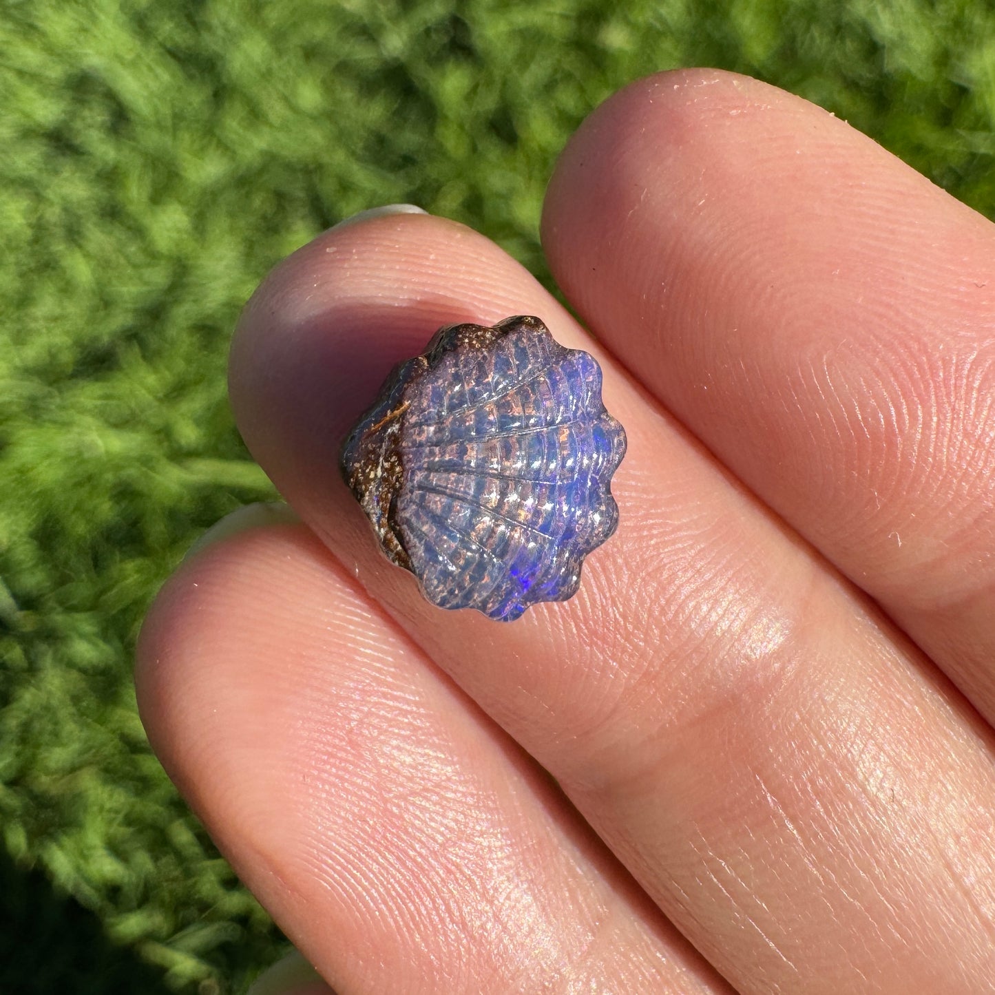 2.81 Ct fan shell boulder opal carving