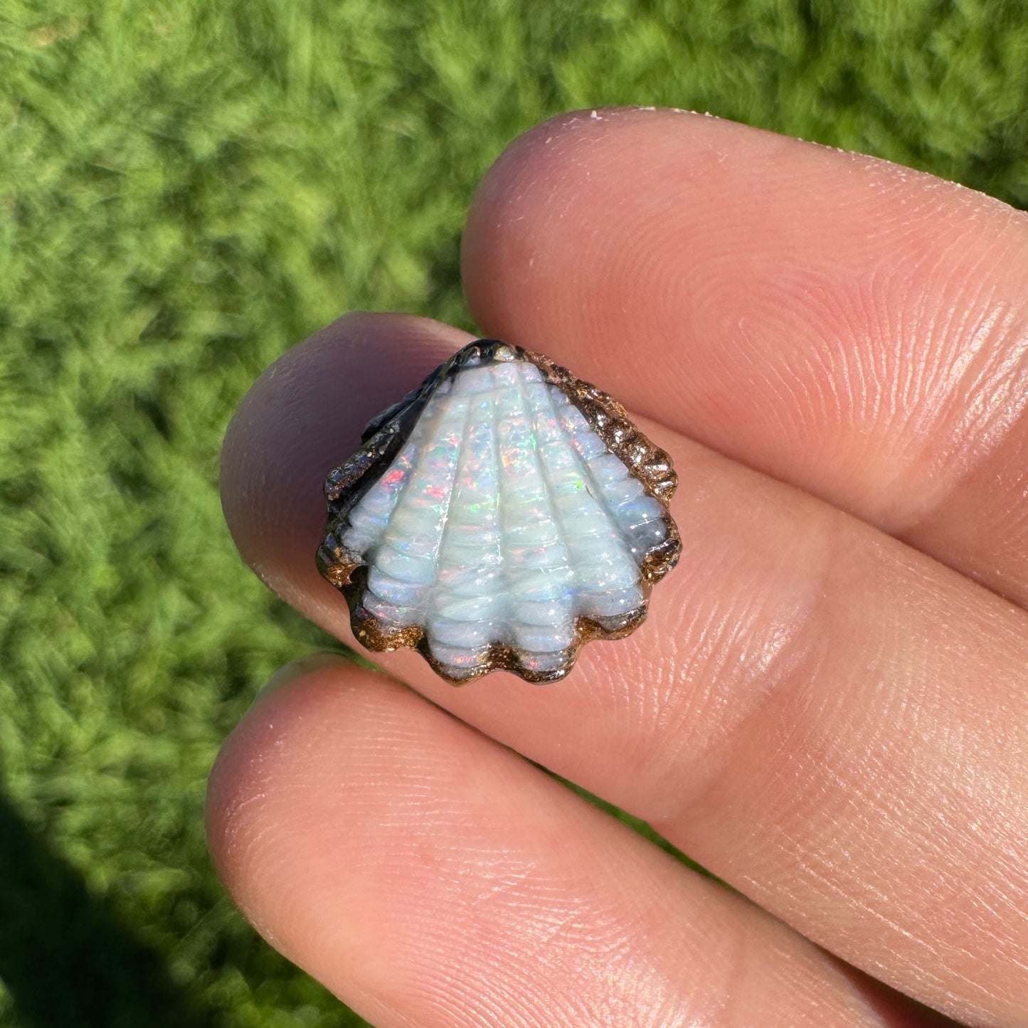 5.29 Ct small fan shell boulder opal carving