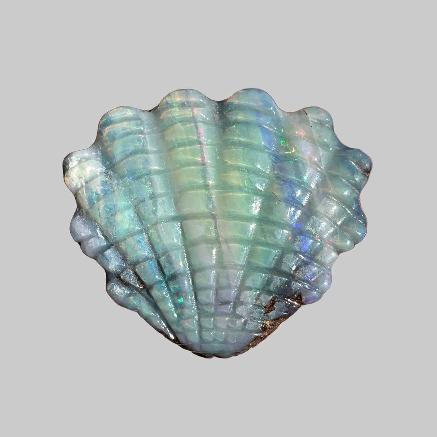12.93 Ct shell boulder opal carving