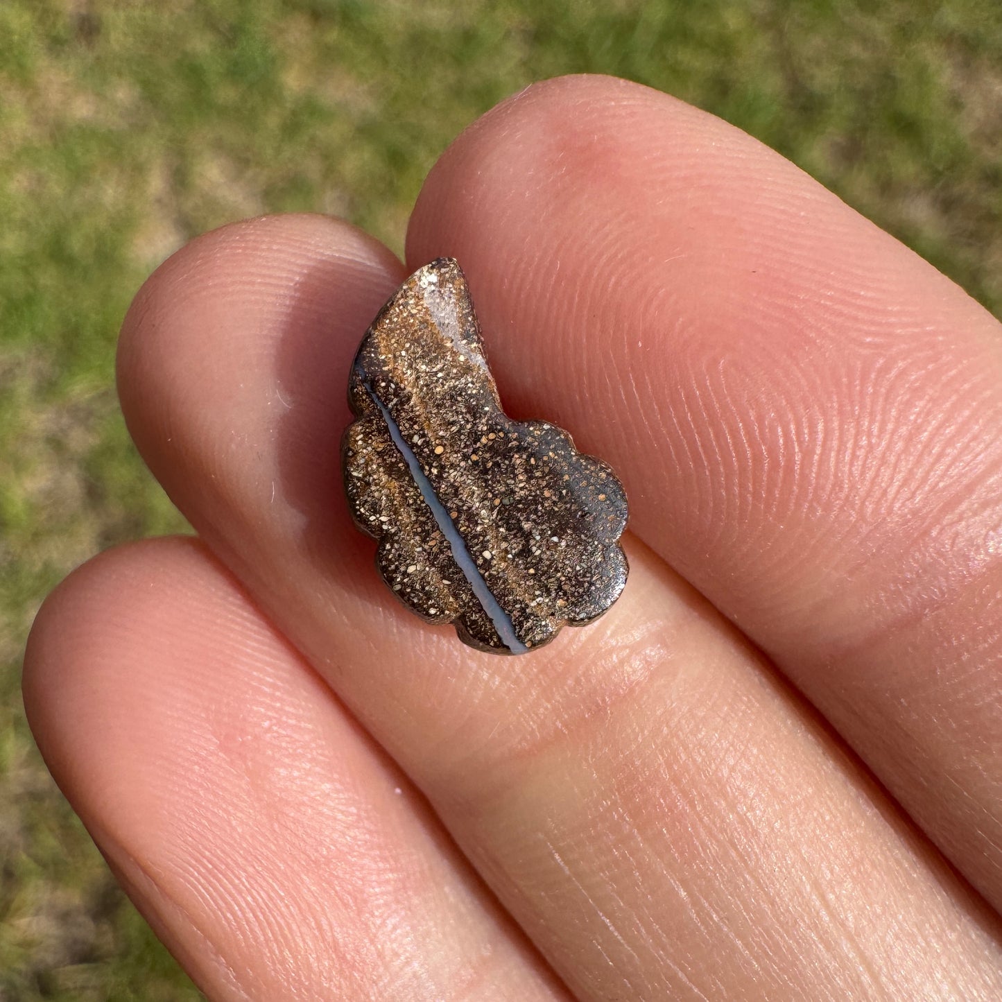 2.99 Ct spiral shell boulder opal carving