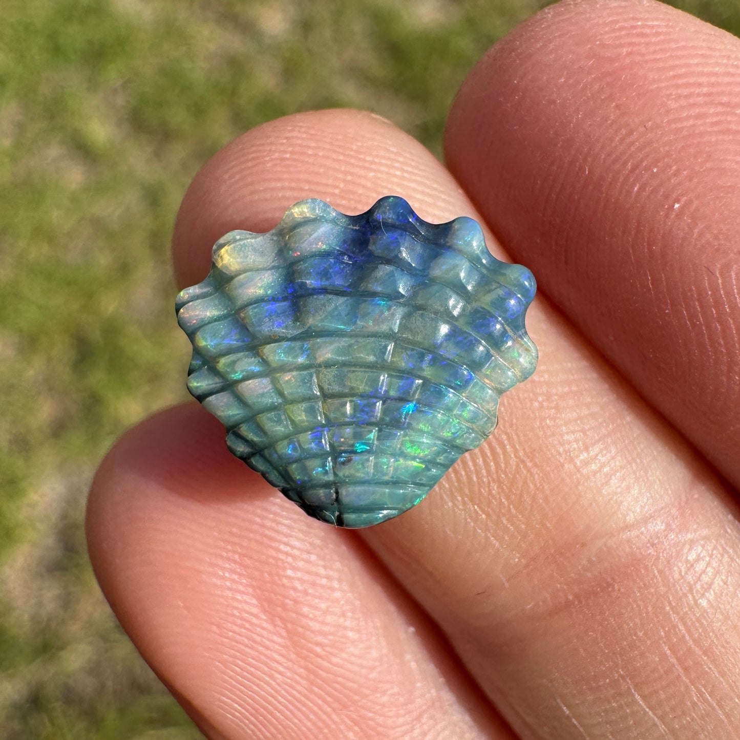 4.74 Ct shell boulder opal carving