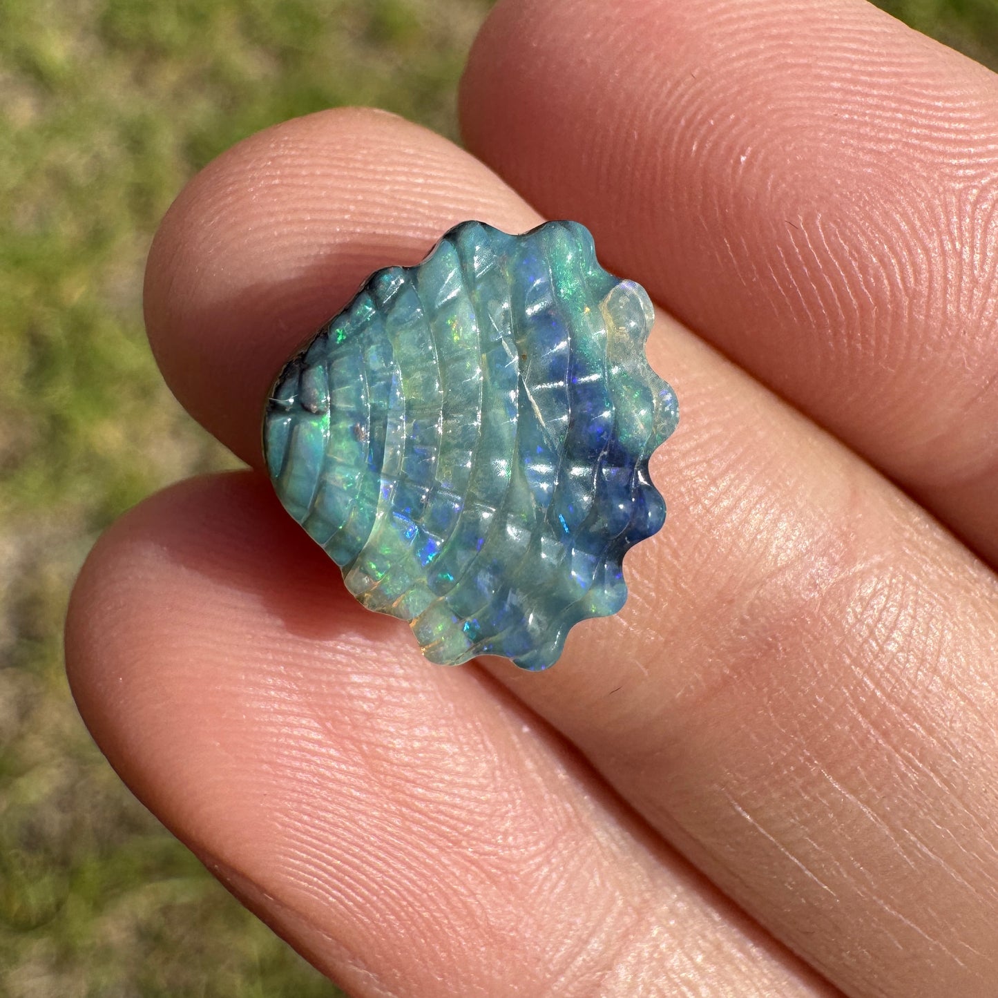 4.74 Ct shell boulder opal carving