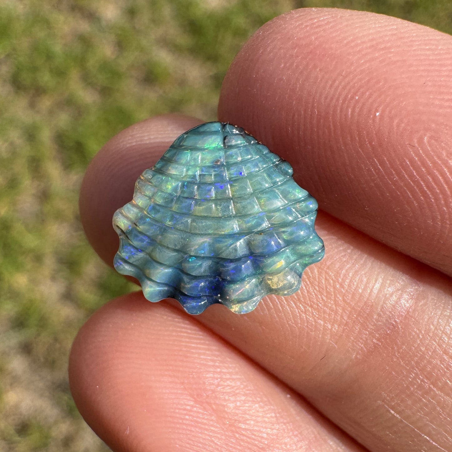 4.74 Ct shell boulder opal carving