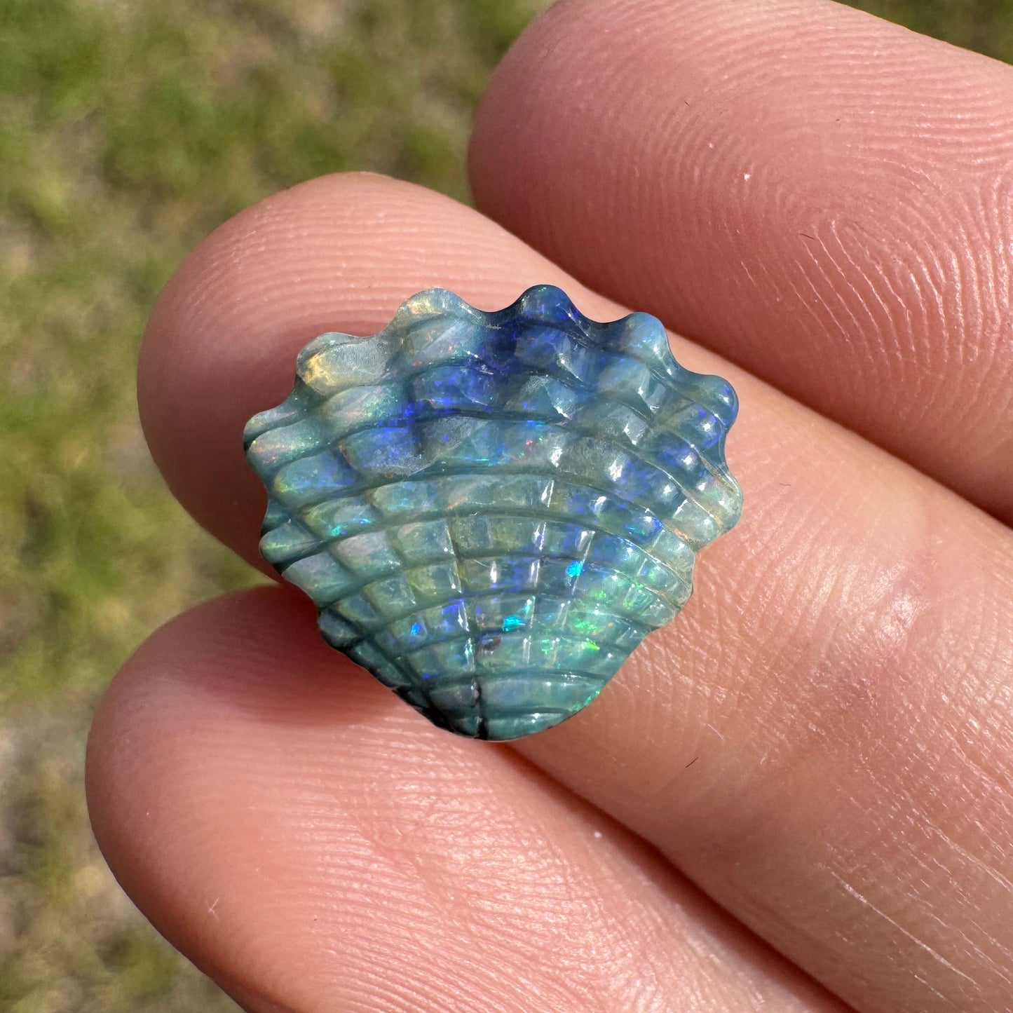 4.74 Ct shell boulder opal carving