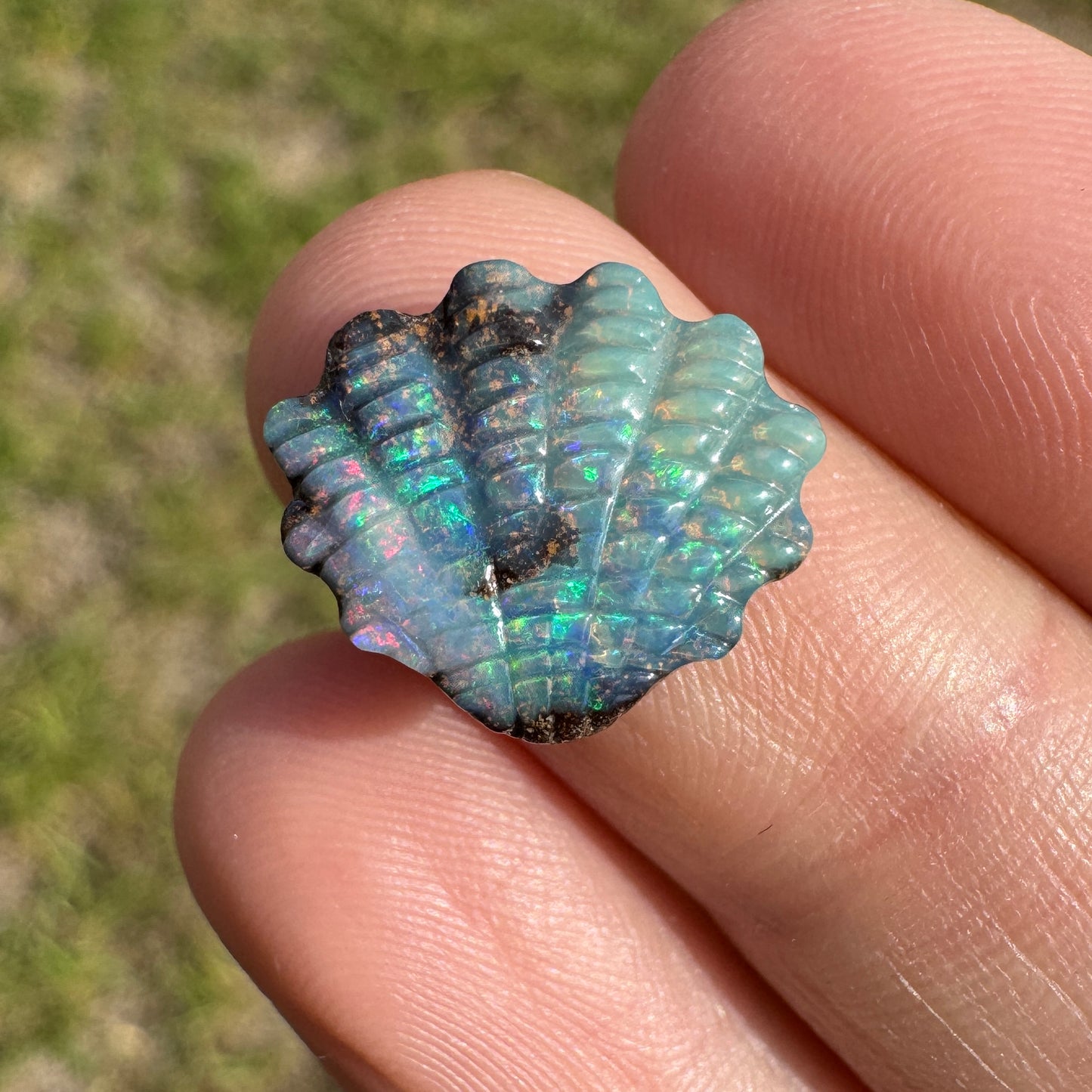 4.75 Ct shell boulder opal carving
