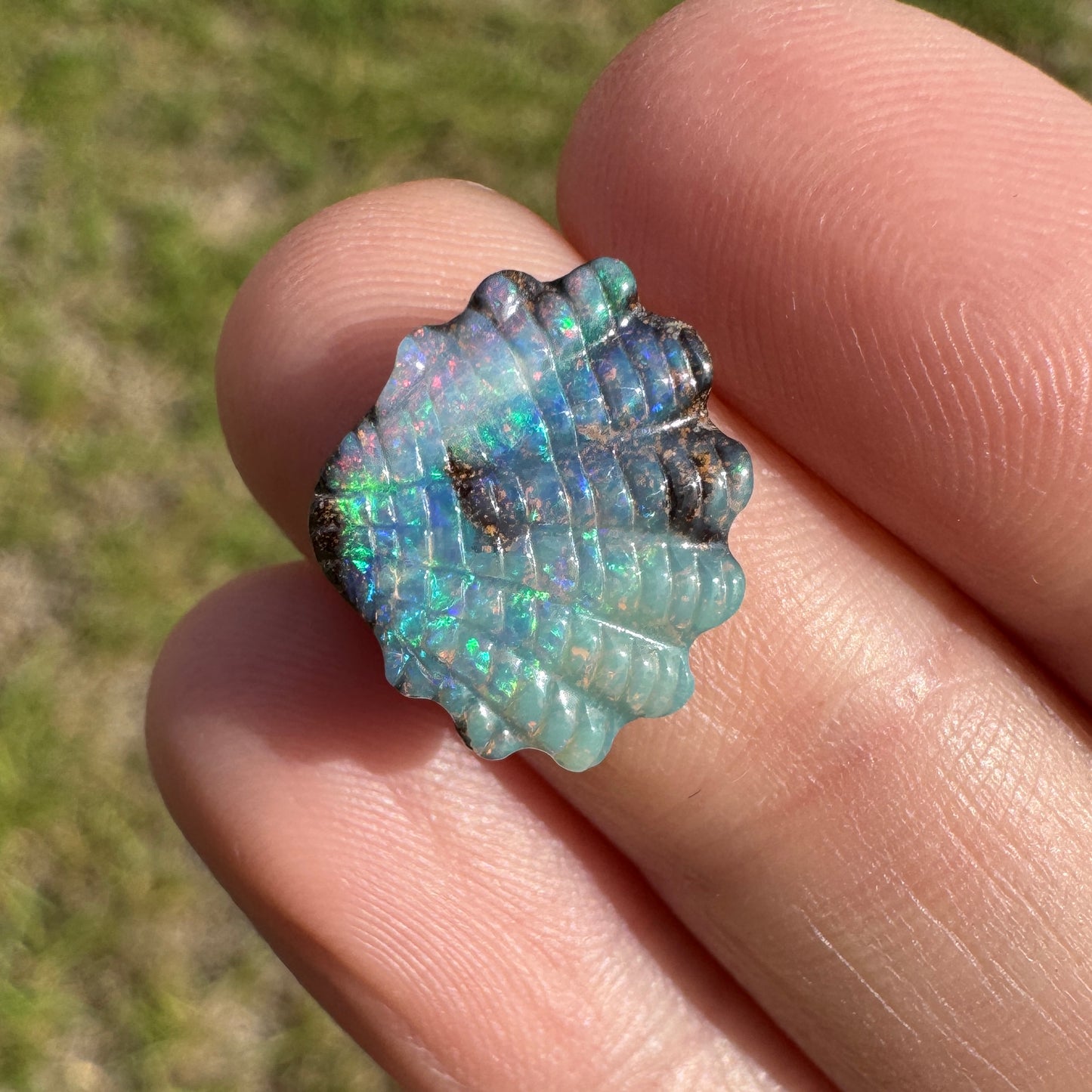 4.75 Ct shell boulder opal carving