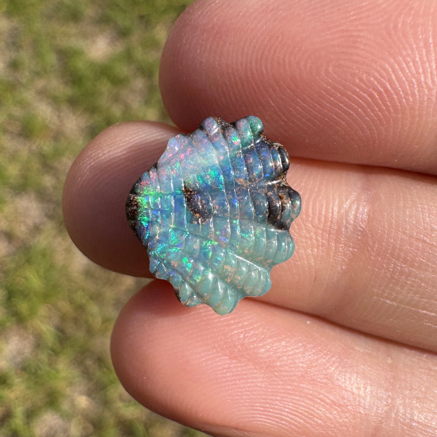 4.75 Ct shell boulder opal carving