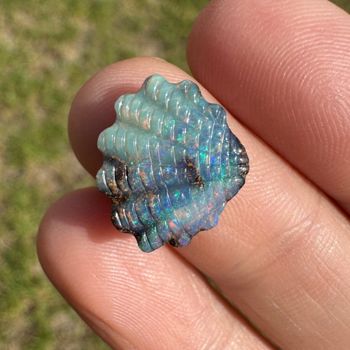 4.75 Ct shell boulder opal carving
