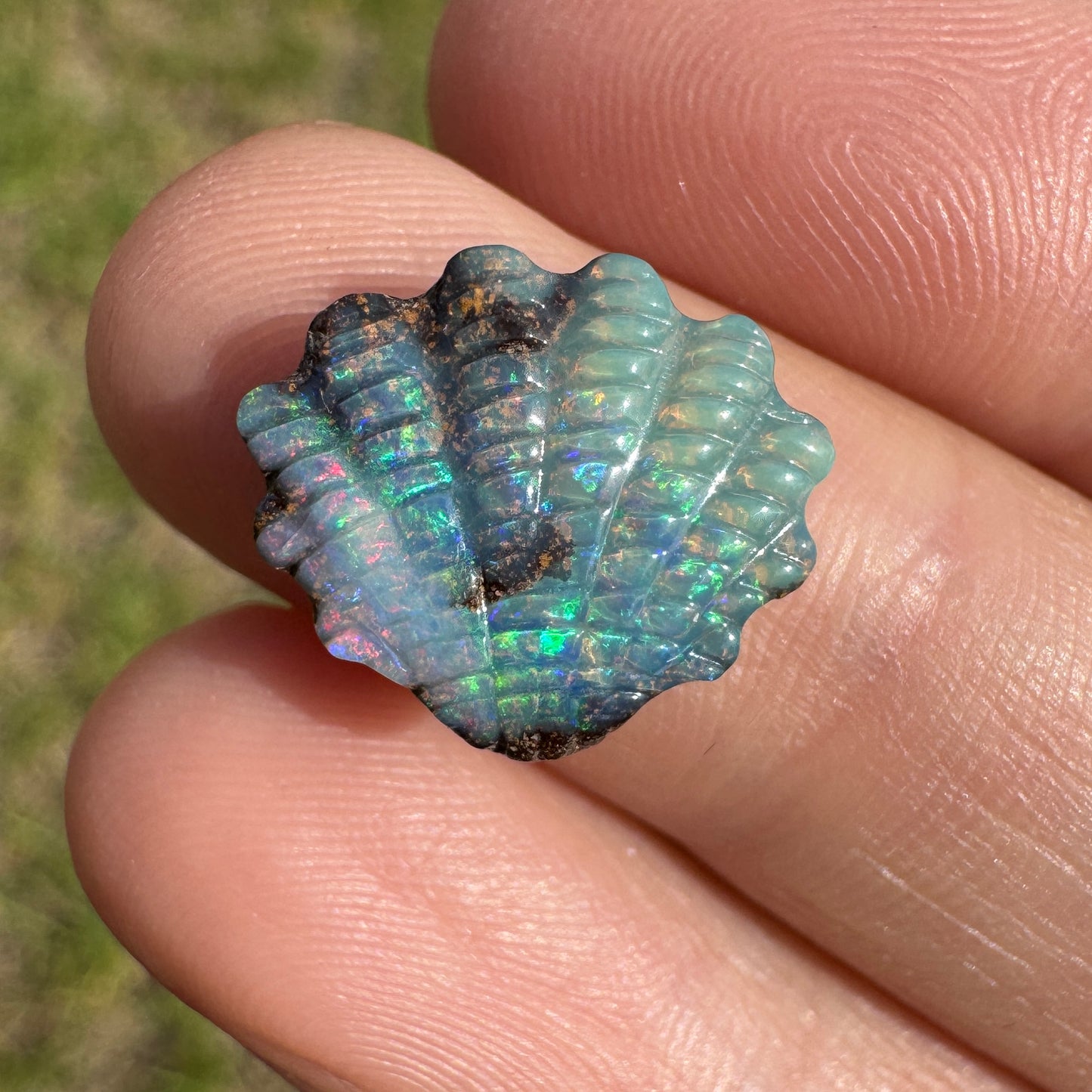 4.75 Ct shell boulder opal carving
