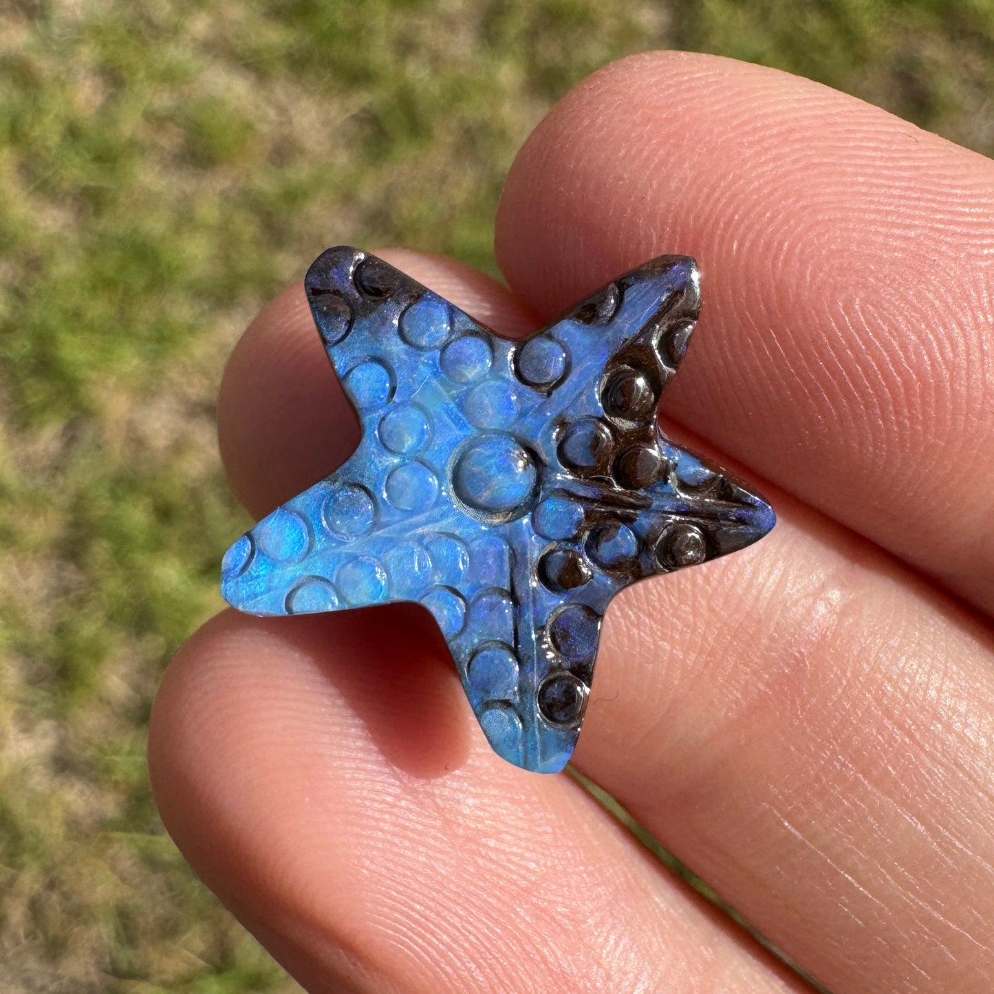 8.01 Ct starfish boulder opal carving