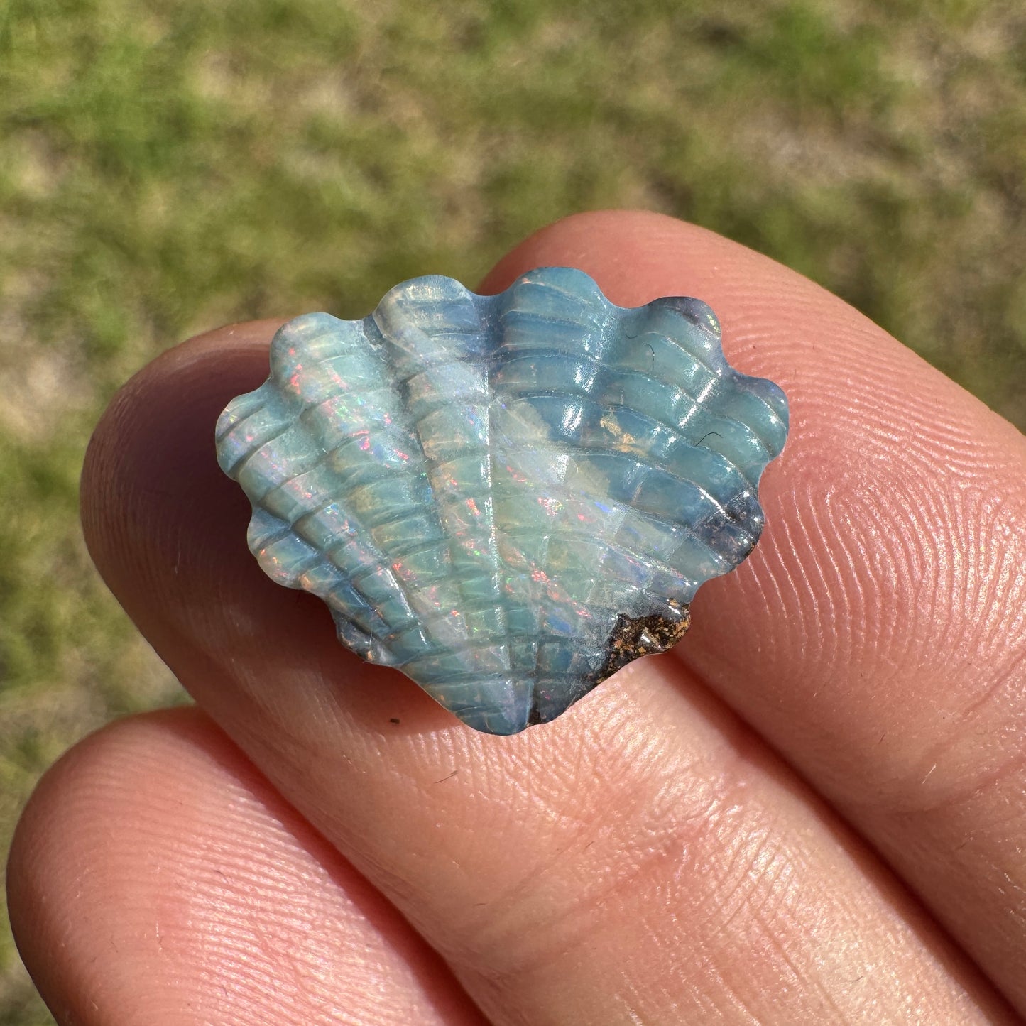 6.83 Ct shell boulder opal carving