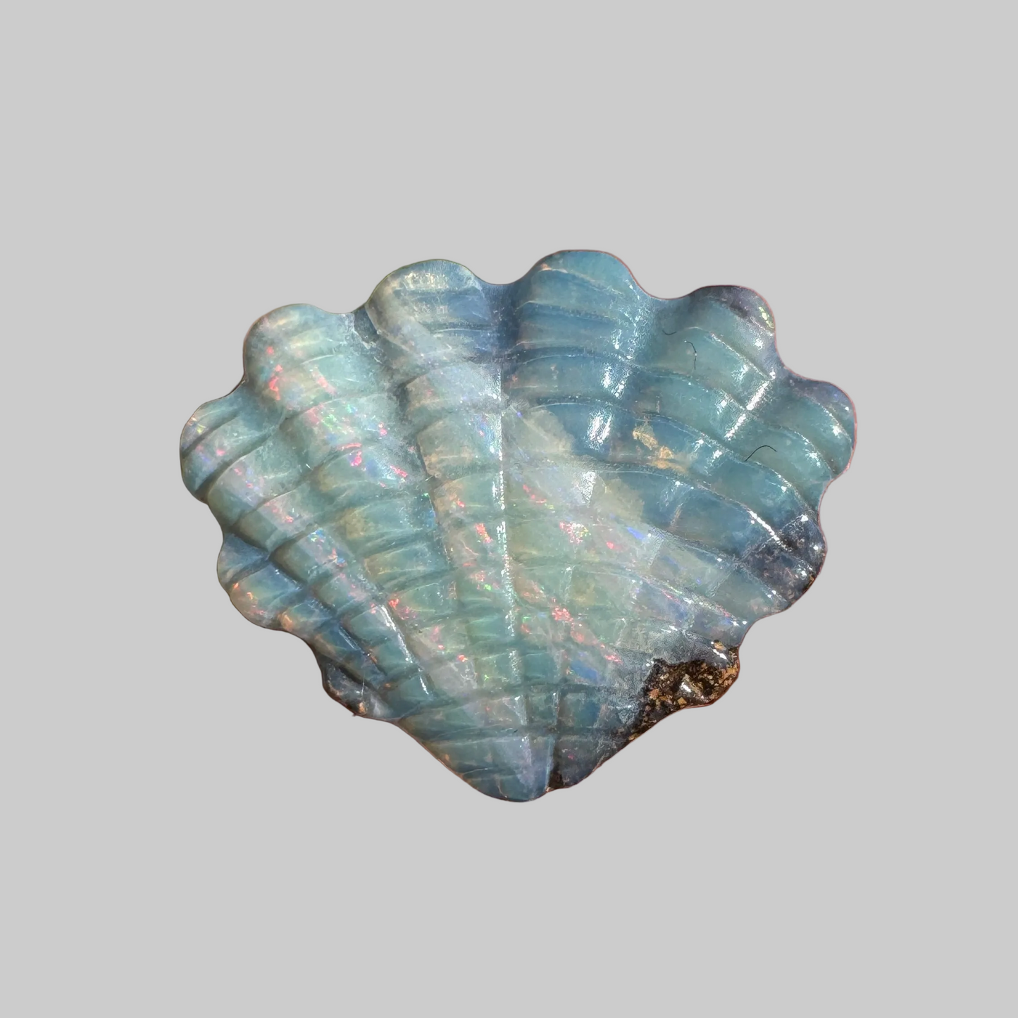 6.83 Ct shell boulder opal carving
