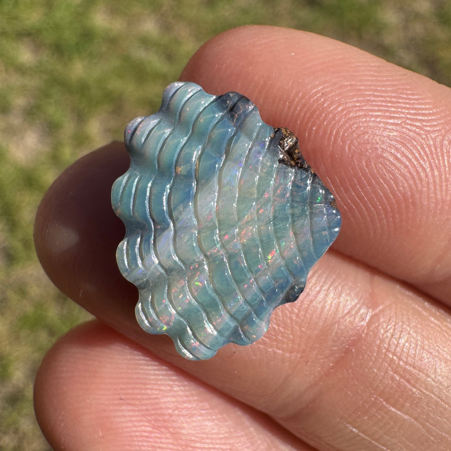 6.83 Ct shell boulder opal carving