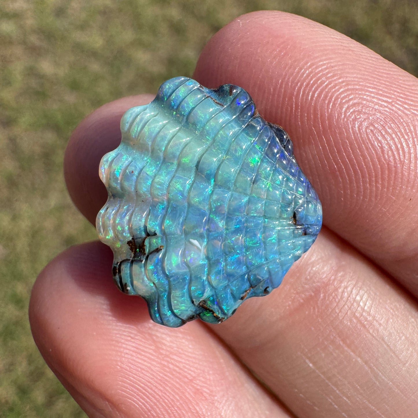 10.22 Ct shell boulder opal carving