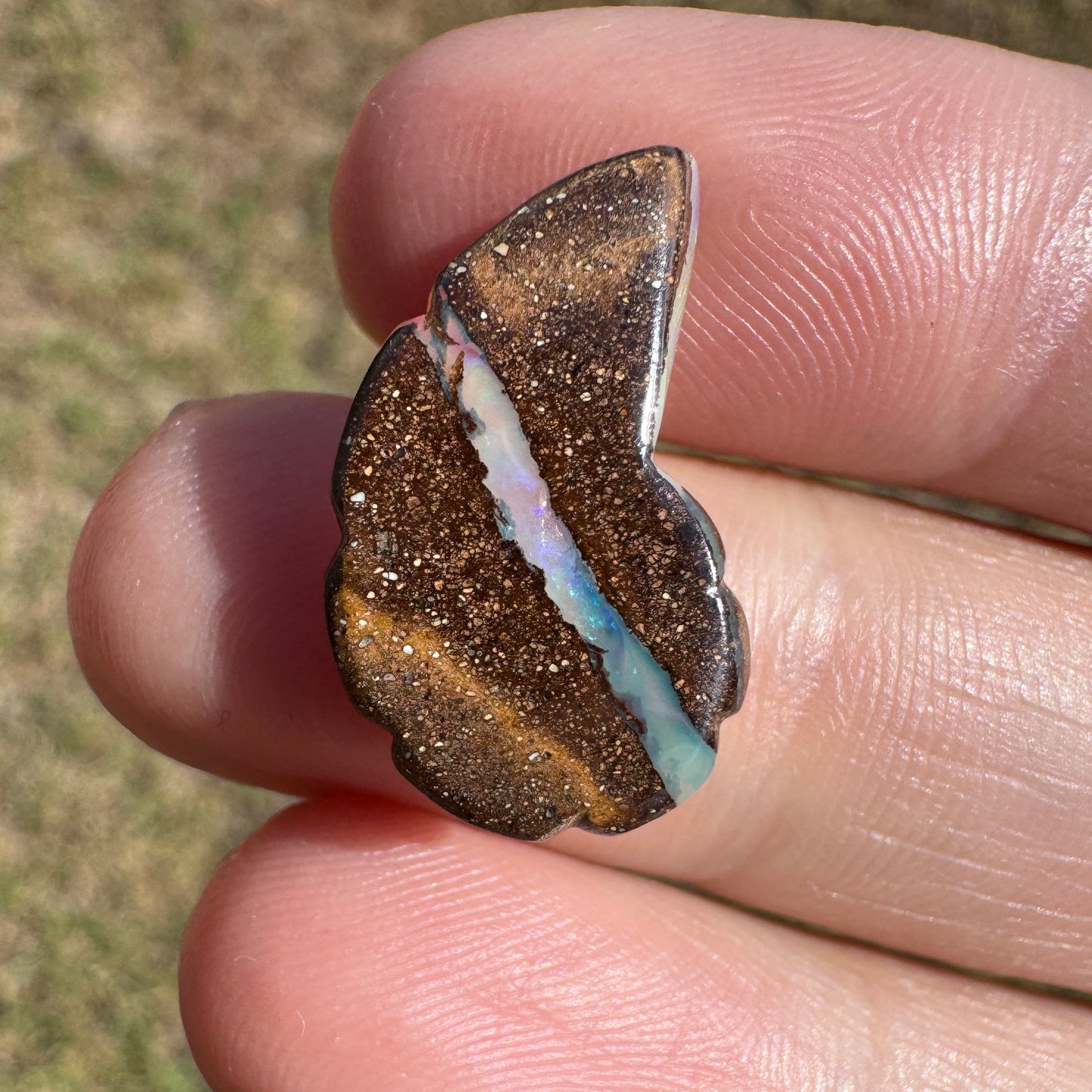 7.12 Ct shell boulder opal carving