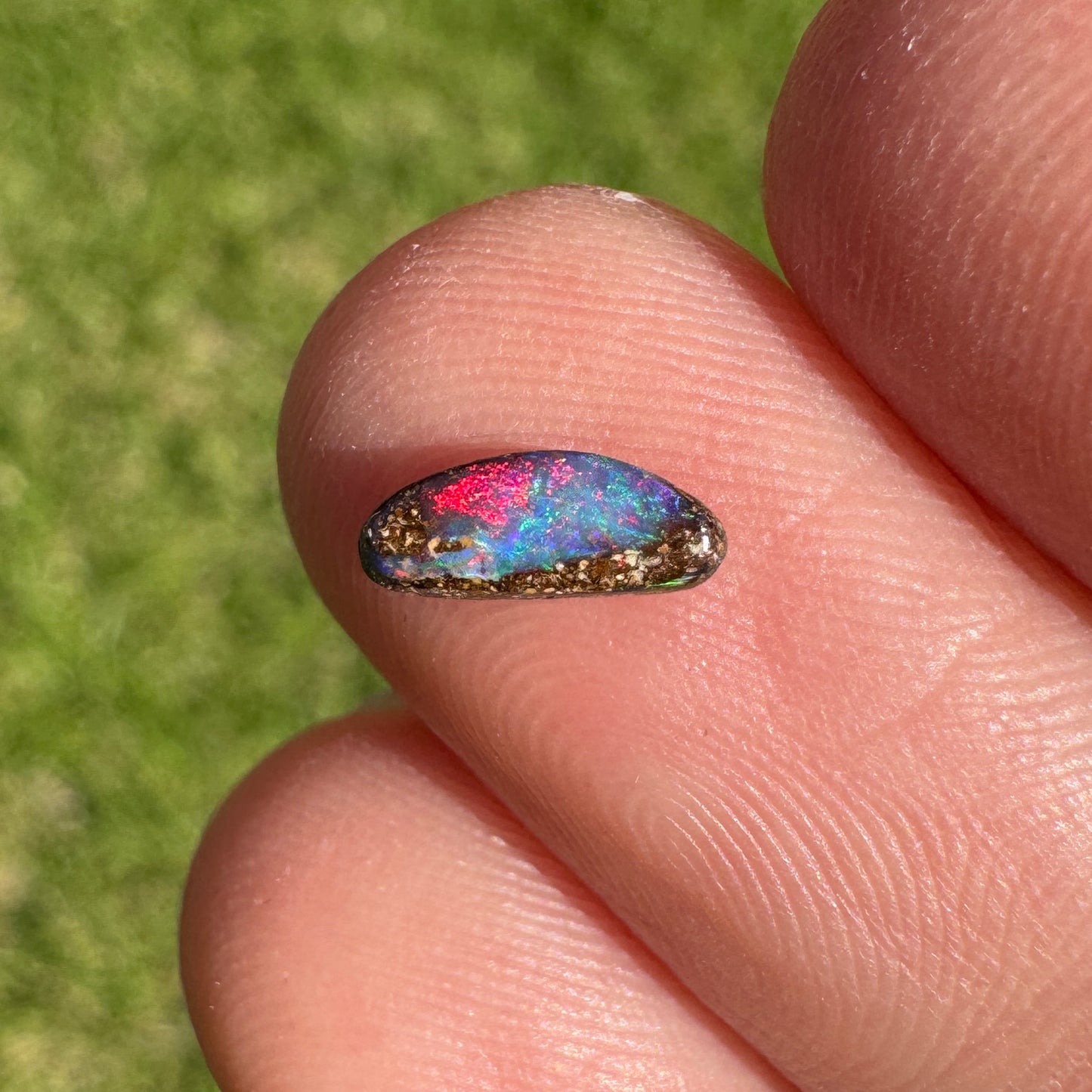 0.31 Ct extra small red boulder opal
