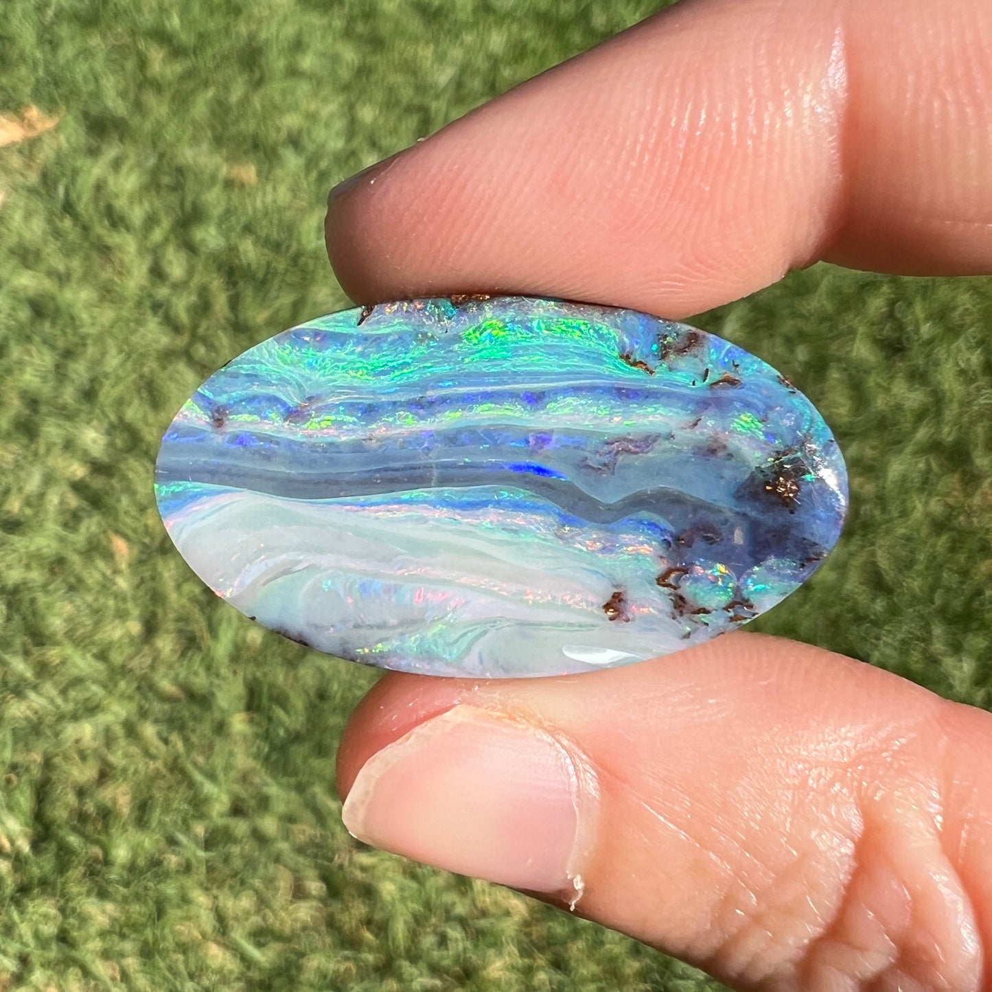 29.28 Ct extra large stripy oval boulder opal