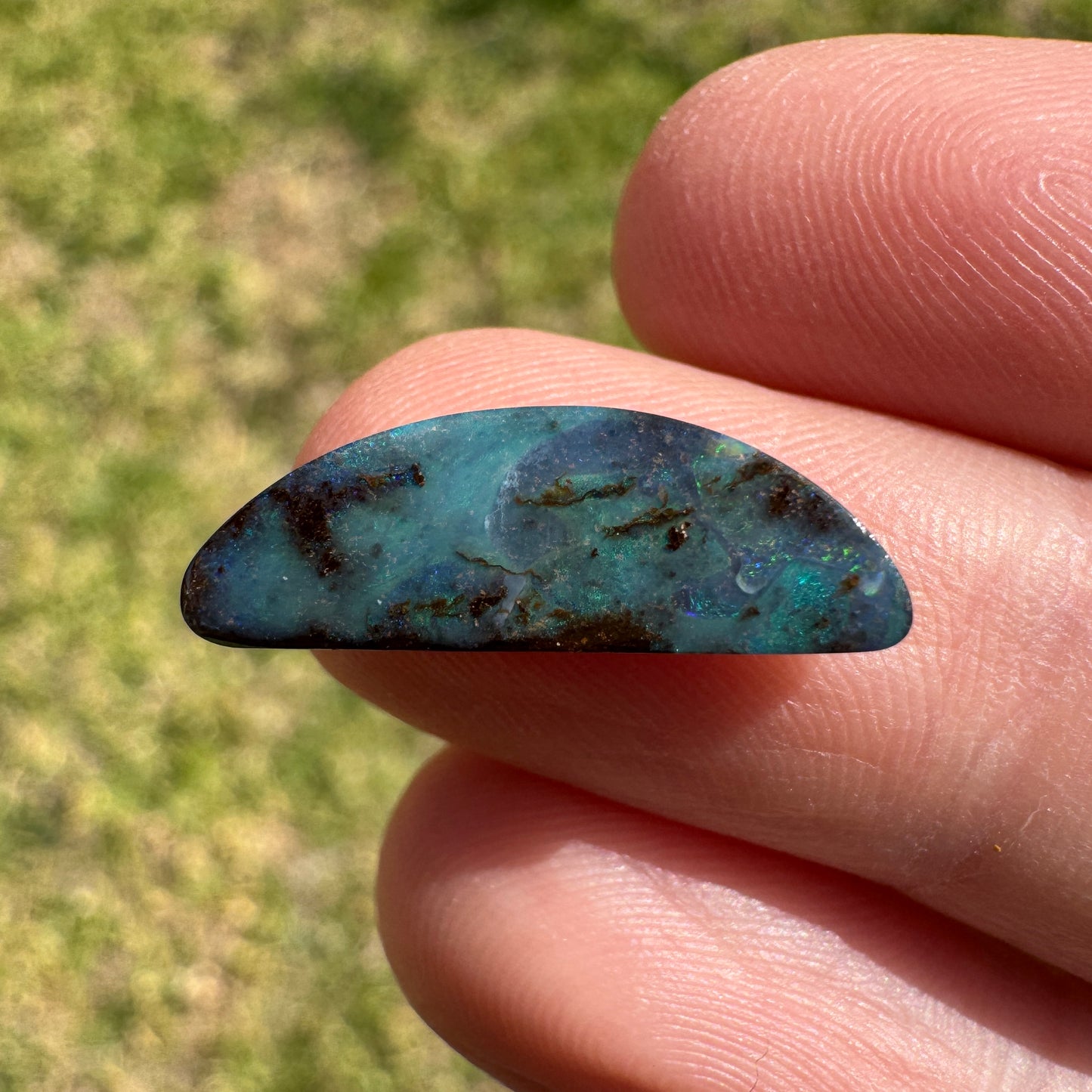 3.59 Ct half-circle boulder opal