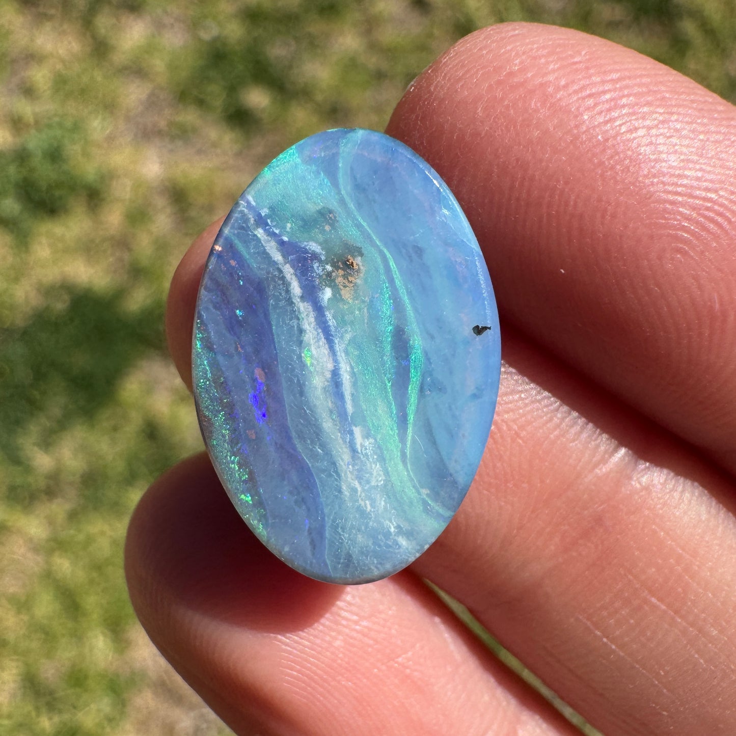 8.60 Ct green-blue oval boulder opal