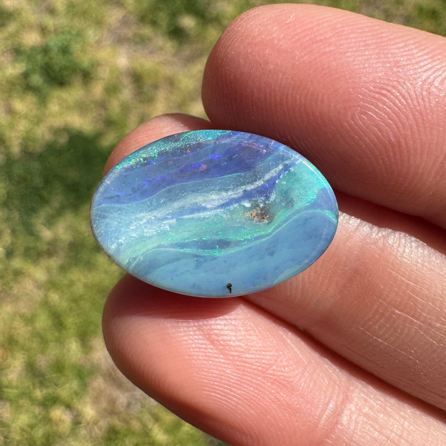 8.60 Ct green-blue oval boulder opal
