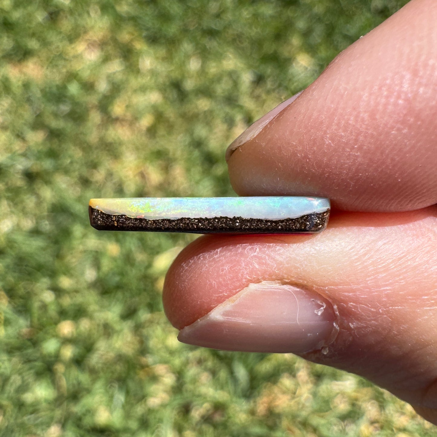 3.32 Ct narrow triangle boulder opal
