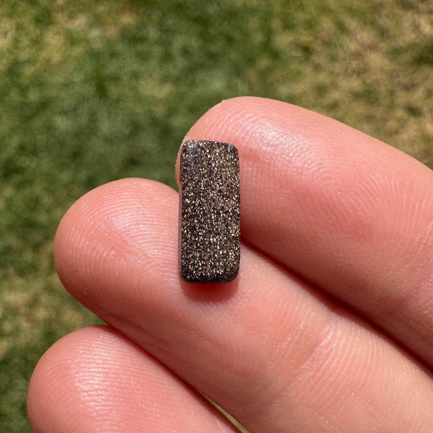 1.31 Ct red and green black gem boulder opal