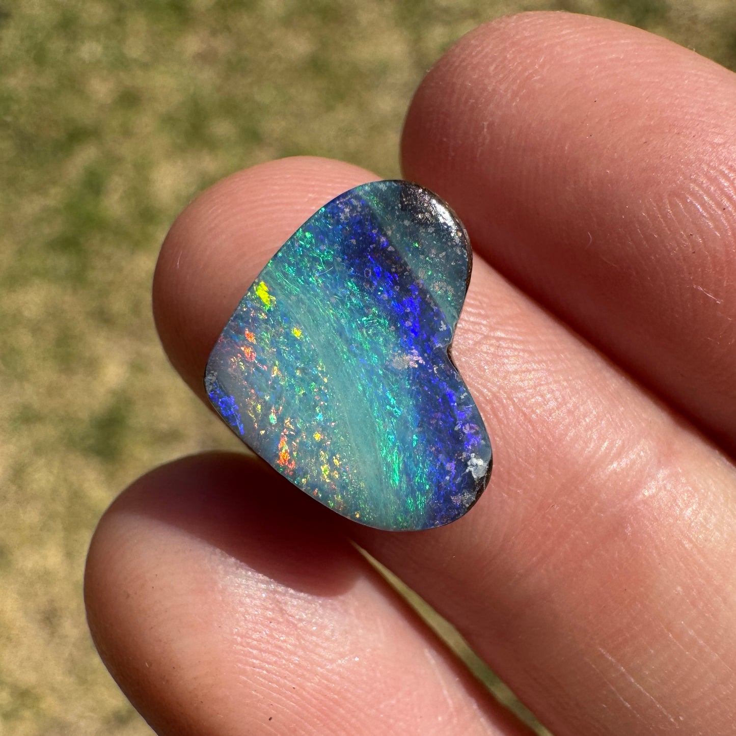 3.92 Ct blue-stripe heart boulder opal