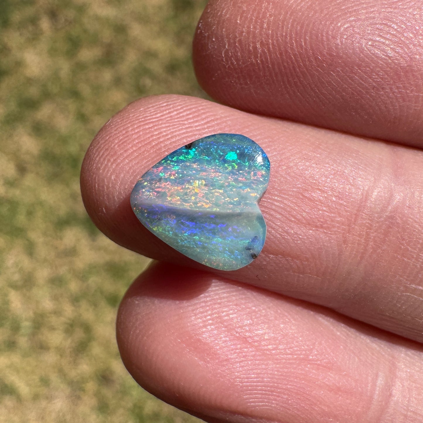 2.27 Ct small rainbow boulder opal heart