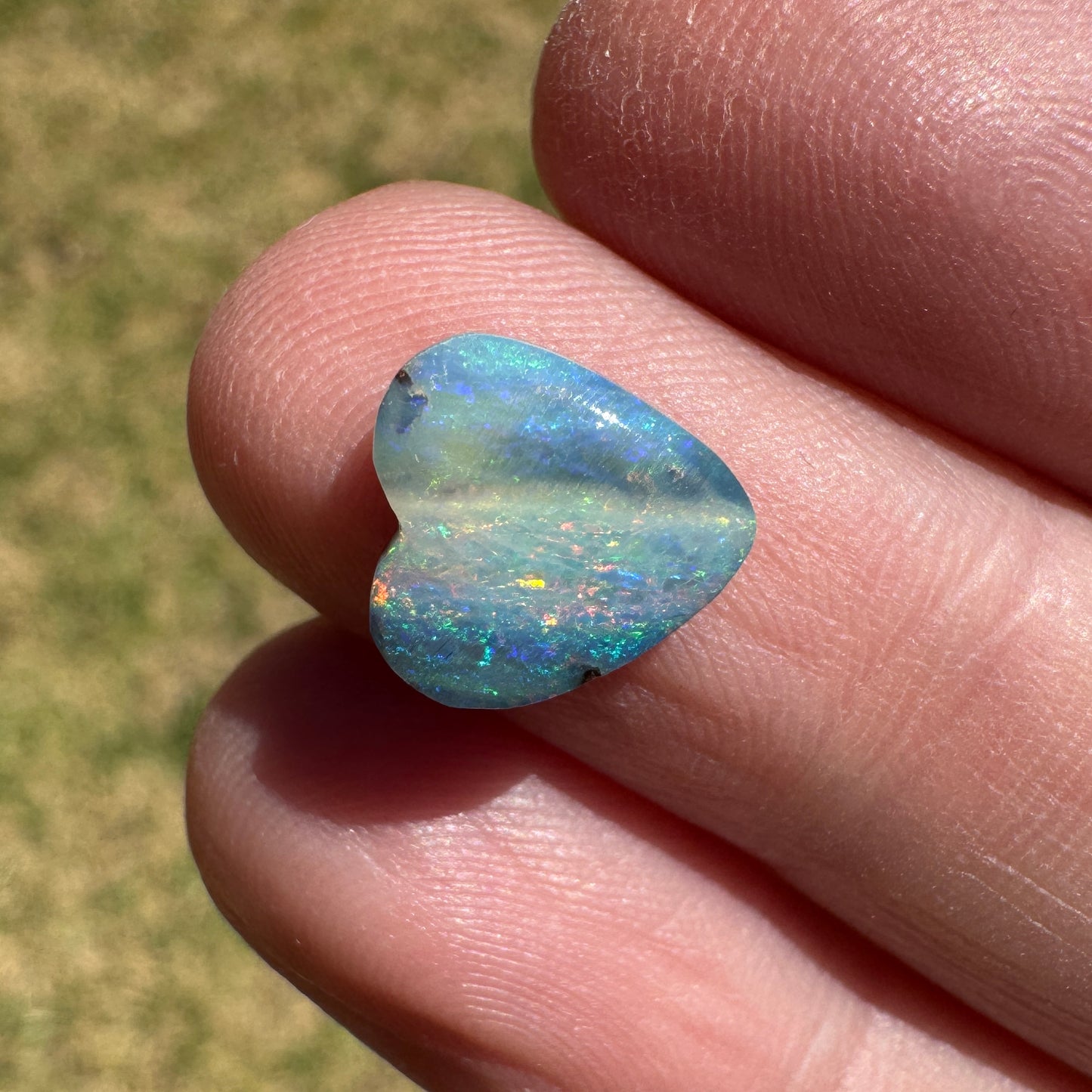 2.27 Ct small rainbow boulder opal heart