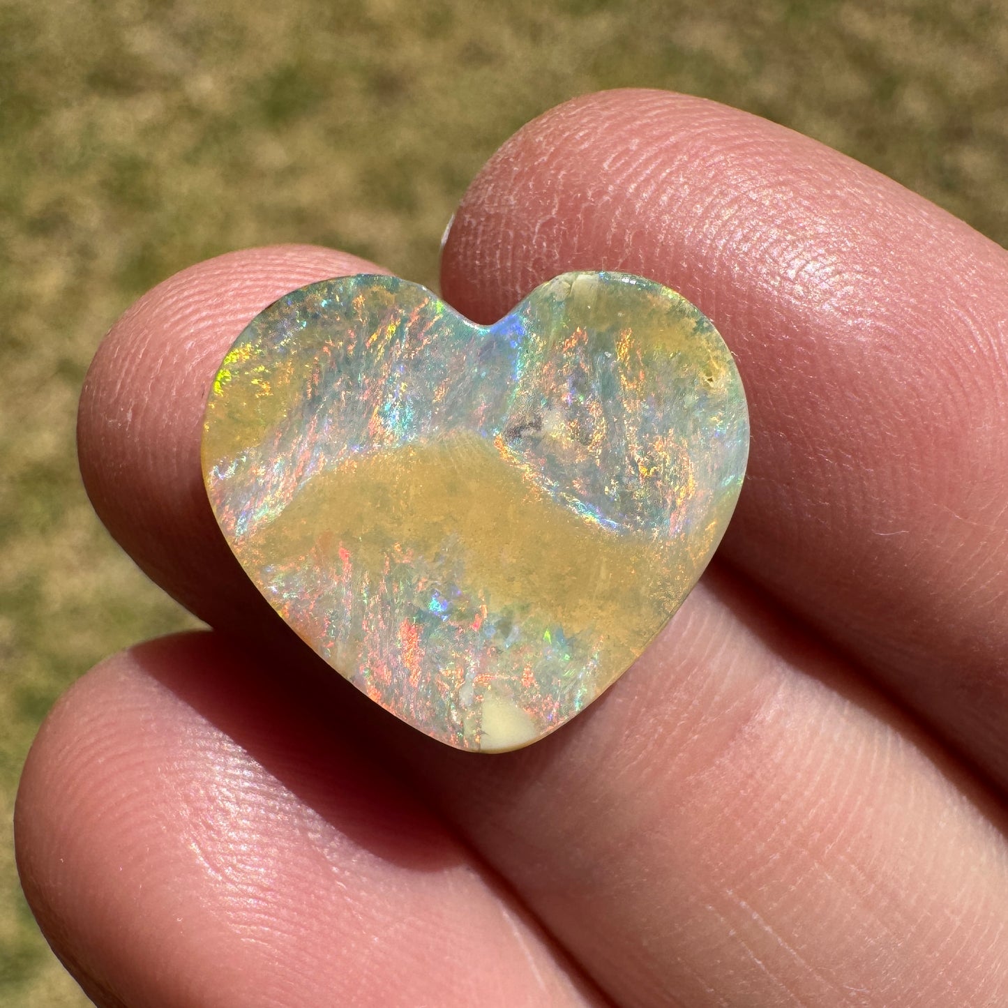 5.65 Ct rainbow and caramel swirl heart boulder opal