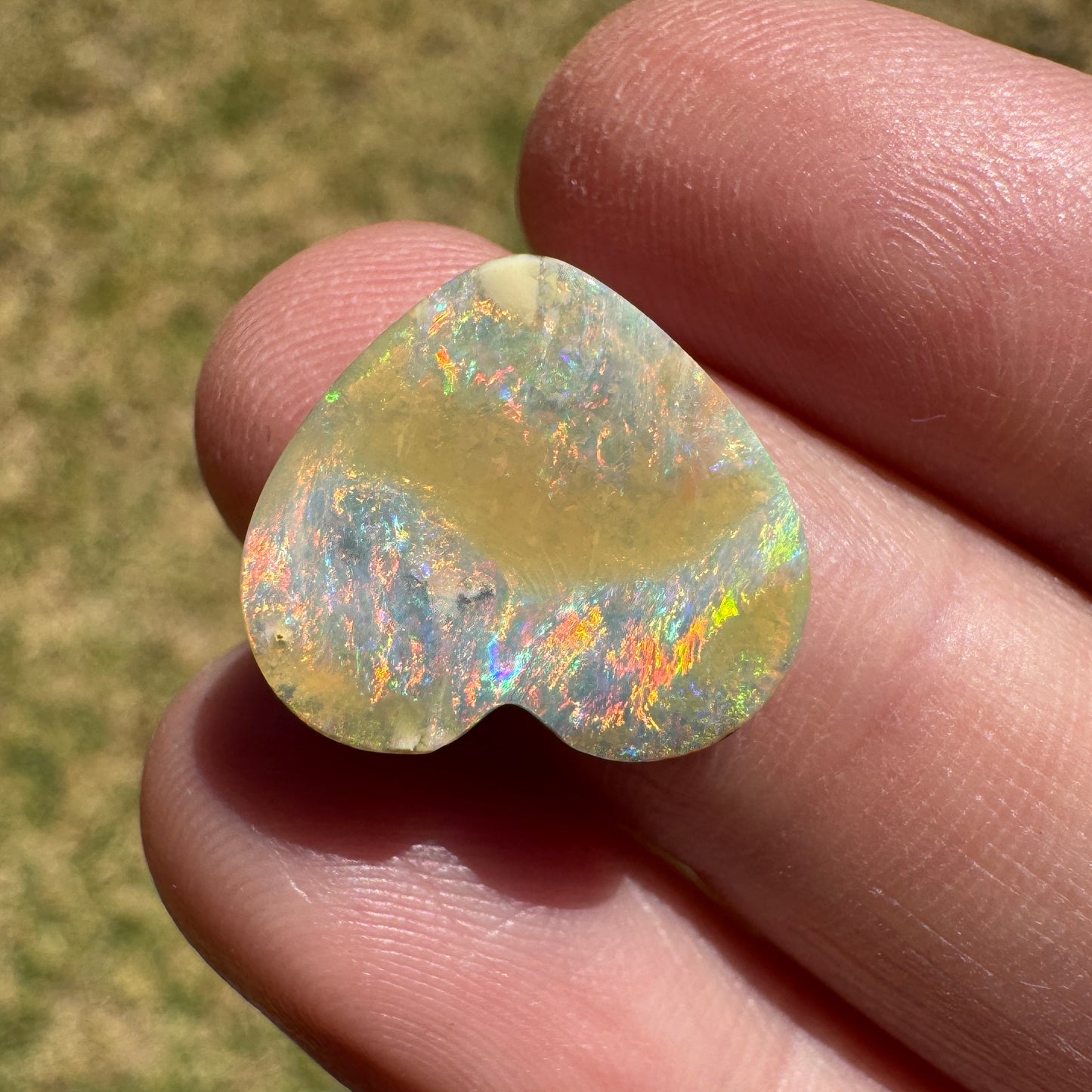 5.65 Ct rainbow and caramel swirl heart boulder opal