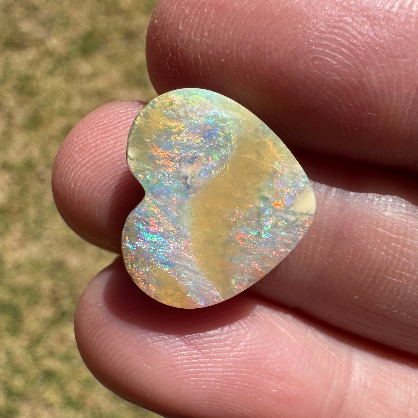 5.65 Ct rainbow and caramel swirl heart boulder opal